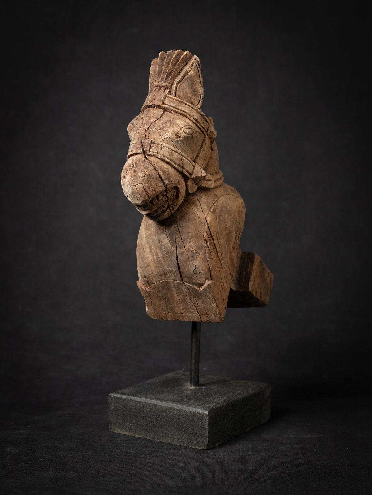 Antique wooden temple fragment of a Horse head
Material : wood
33,5 cm high
10,3 cm wide and 19,5 cm deep
19th century
Weight: 1,16 kgs
Originating from India
Nr: 3830-29
