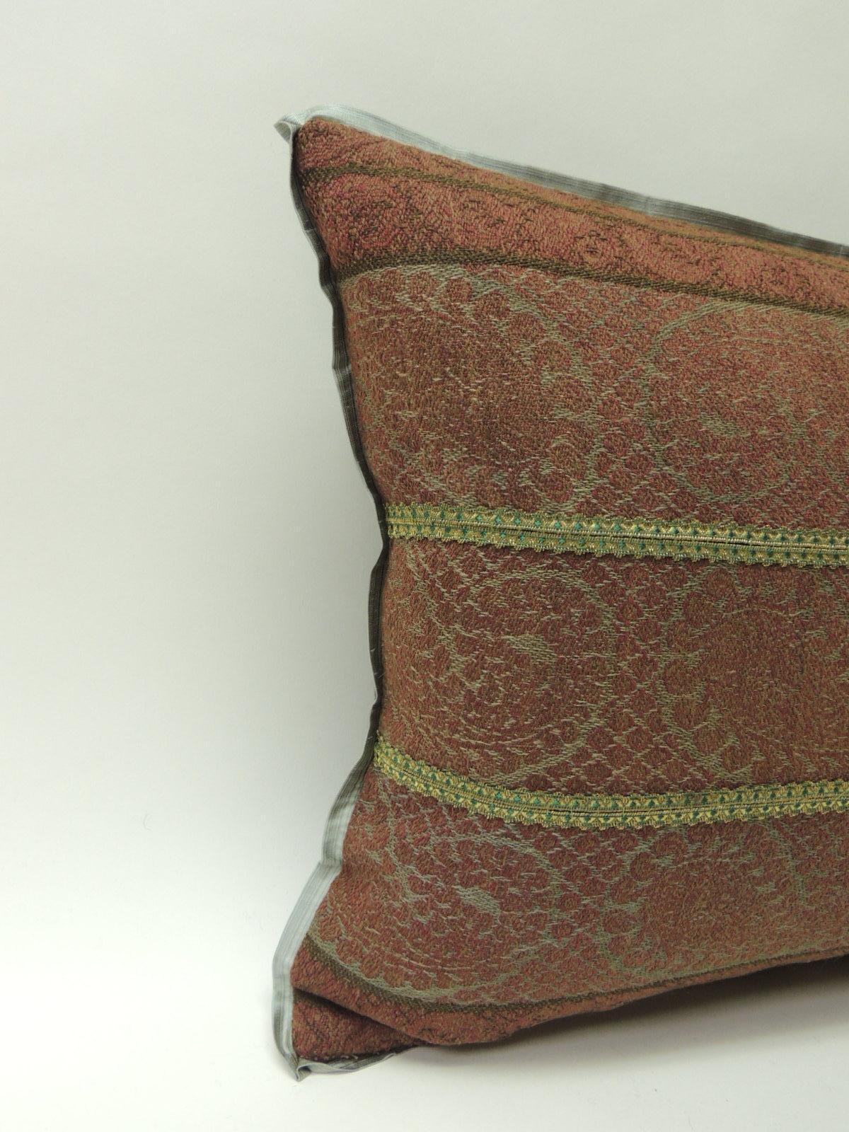 19th century antique woven red Kashmir Paisley Bolster decorative pillow.
19th century antique woven red and green Kashmir stripes decorative long bolster pillow with custom flat silk trim and hunter green cloth fabric backing. Embellish with gold