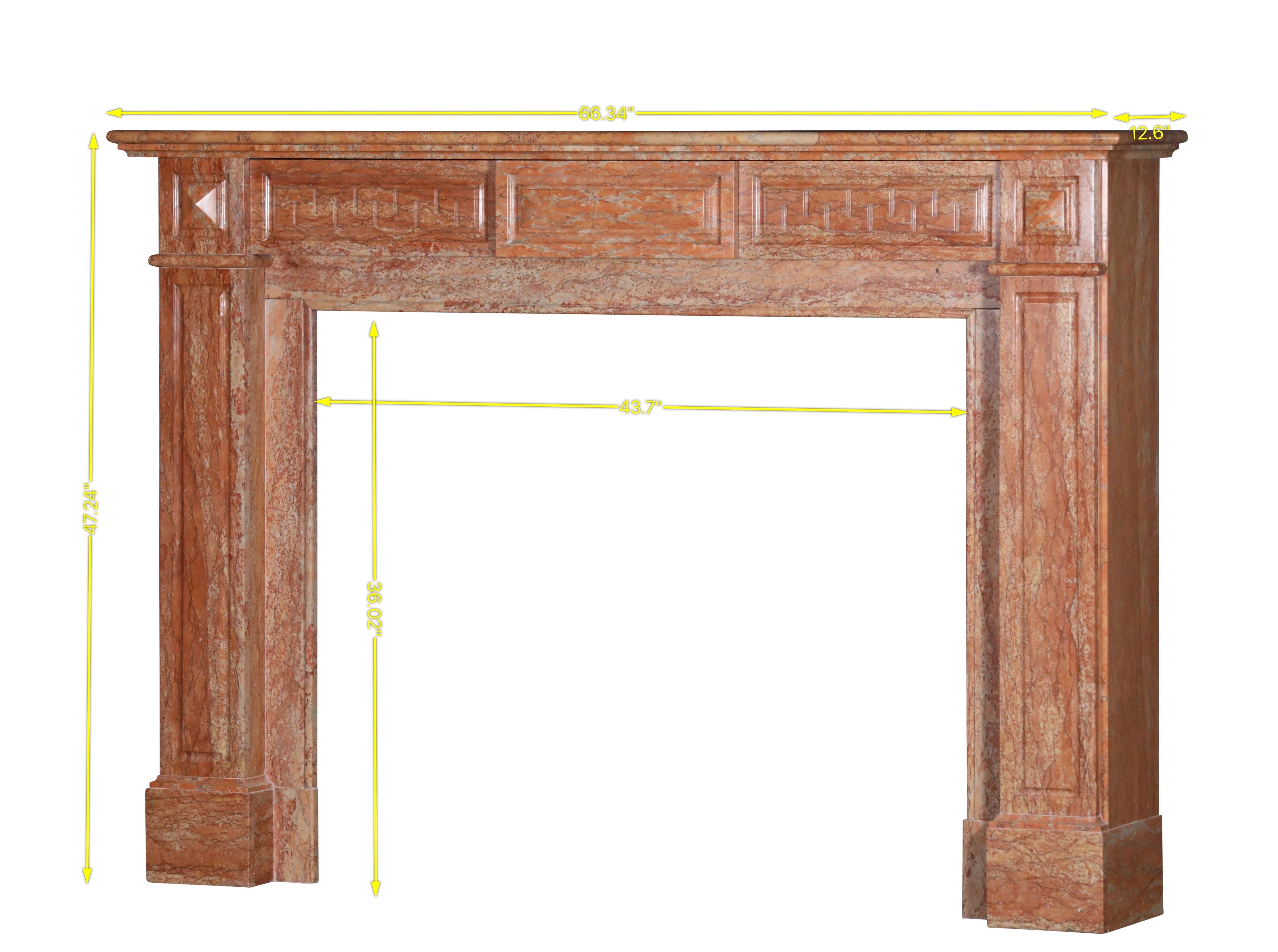 This is a beautiful and historically rich marble fireplace mantel. From its 19th-century origins and being reclaimed from an Antwerp merchant house, it holds a story of elegance and craftsmanship.
Material & Color: Made of reddish-brown marble, its