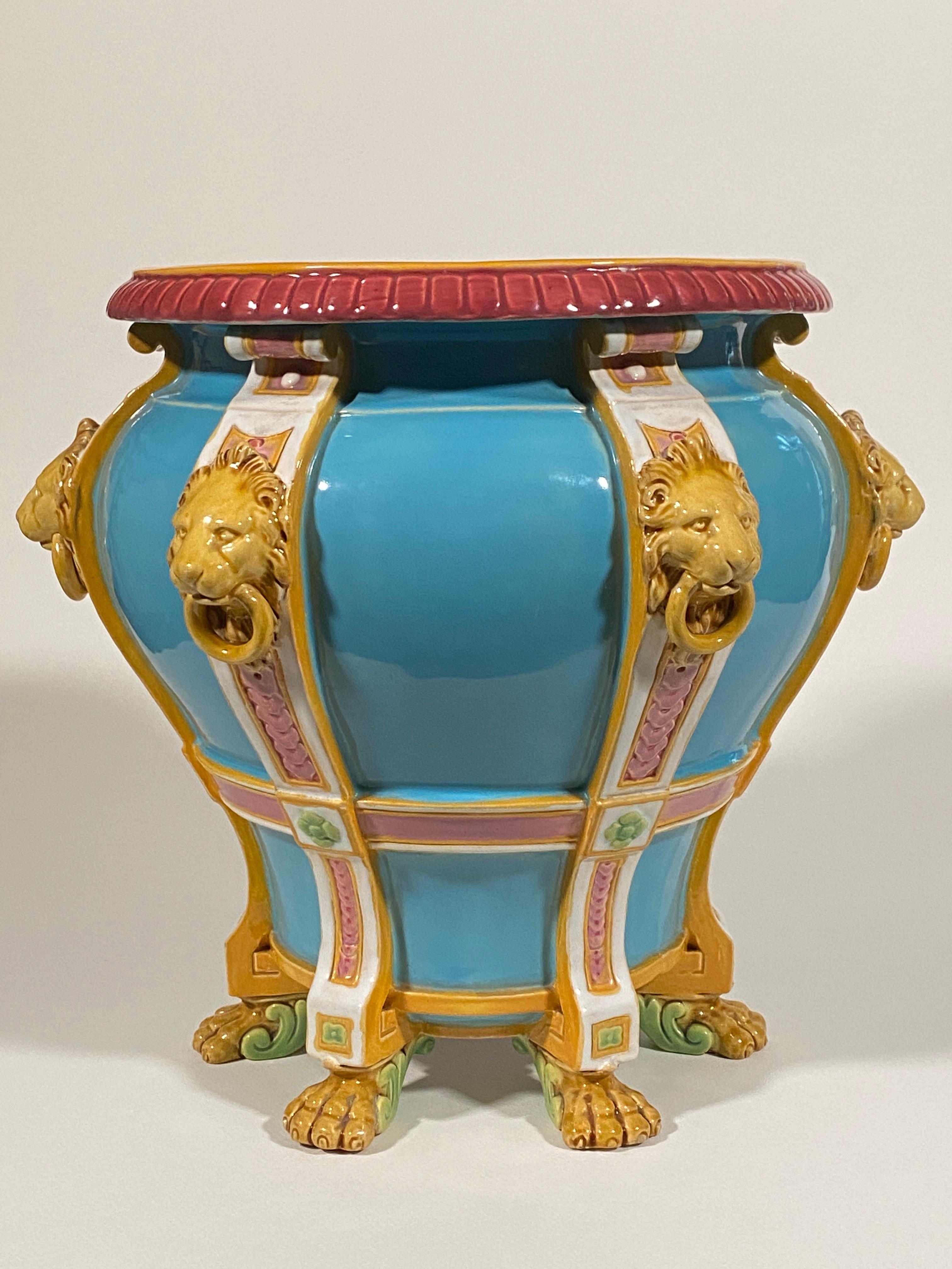 Ceramic jardiniere/planter by British pottery company Minton (Thomas Minton and Sons or Mintons Limited). Minton is a famous ceramicist of the English 19th century Victorian period.

The jardiniere is notable for it's six mold lions' heads and paw