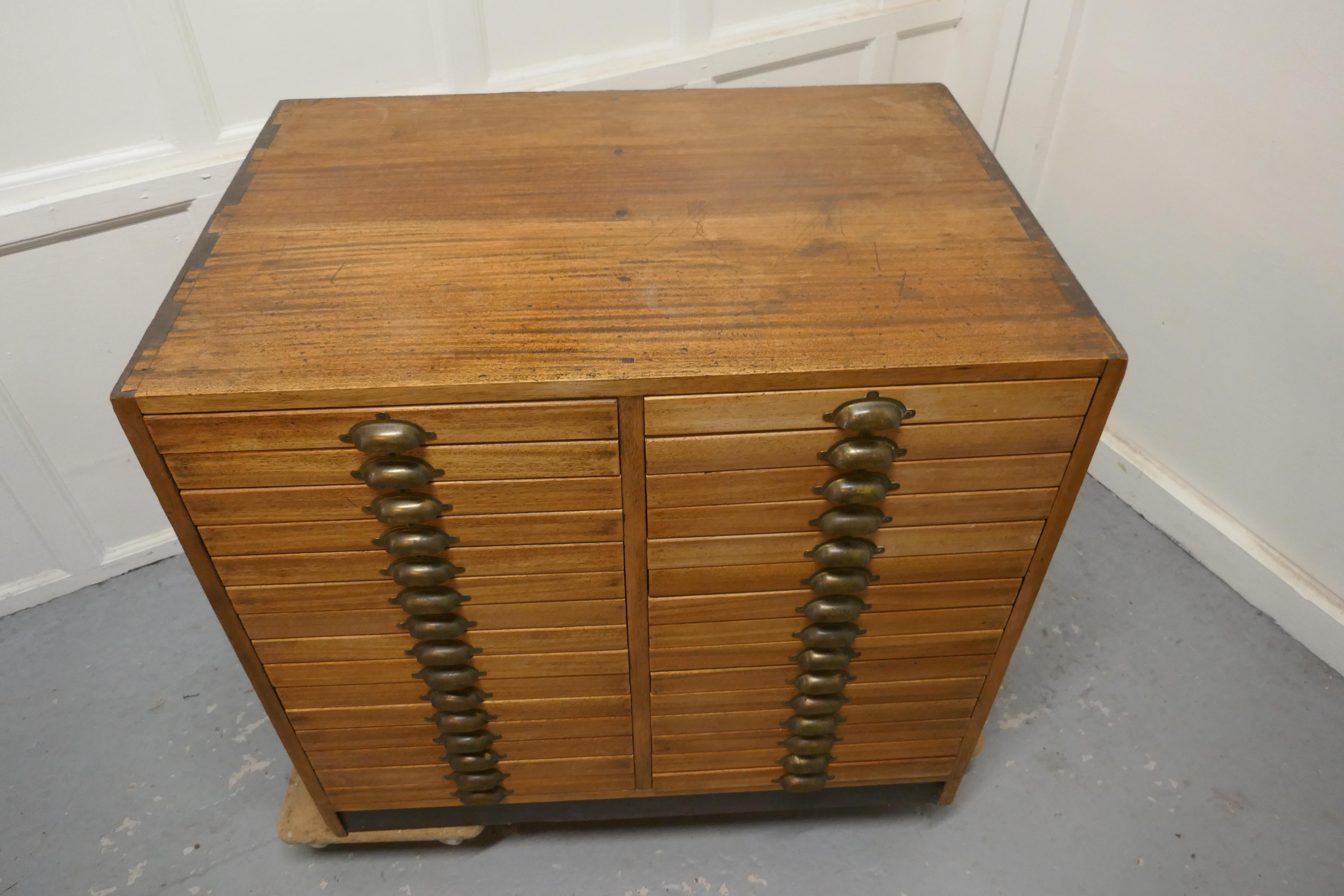 19th century architect’s filing drawers,

Filing cabinet with 30 shallow drawers
This attractive pale mahogany filing cabinet has 30 drawers in 2 banks of 15
The drawers have brass cup handles they are 14.5” wide, 19” long 1.5” high

The cabinet is