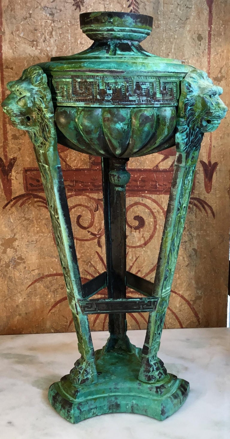 Exceptional antique French bronze architectural element used to be table lamp and later in the years used as decorative object of art. Beautiful oxidized green-turquoise patina, lion heads vine and Greek key motifs, one of a kind object of art for