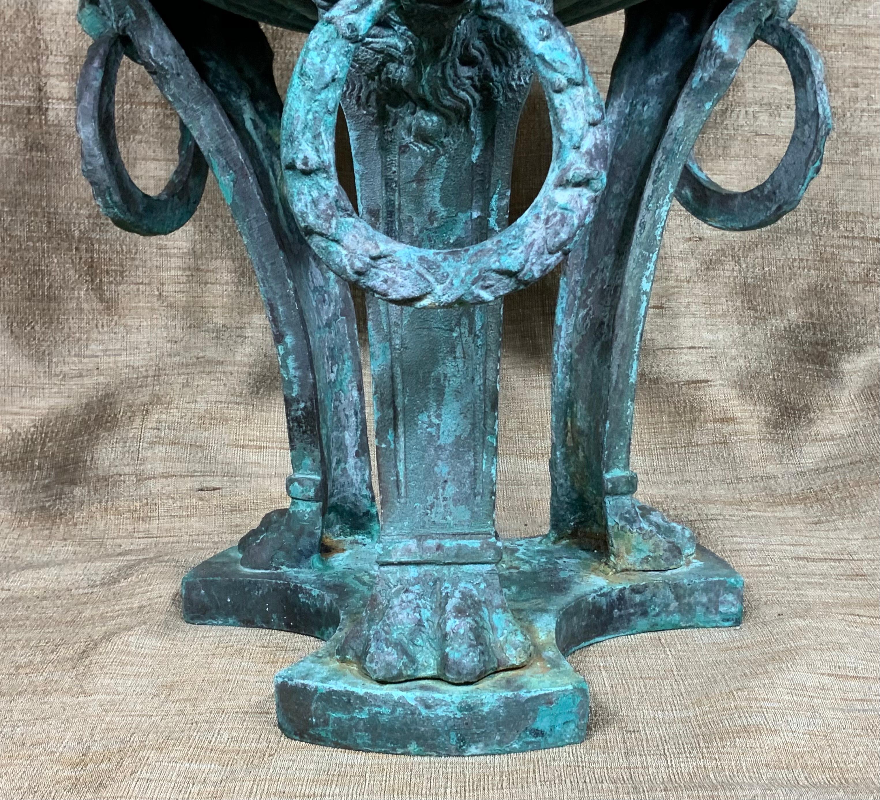 Exceptional antique French bronze architectural element used to be table lamp, and later in the years used as decorative object of art. Beautiful oxidized green-turquoise patina, lion heads with round reign, vine and Greek key motifs, one of a kind