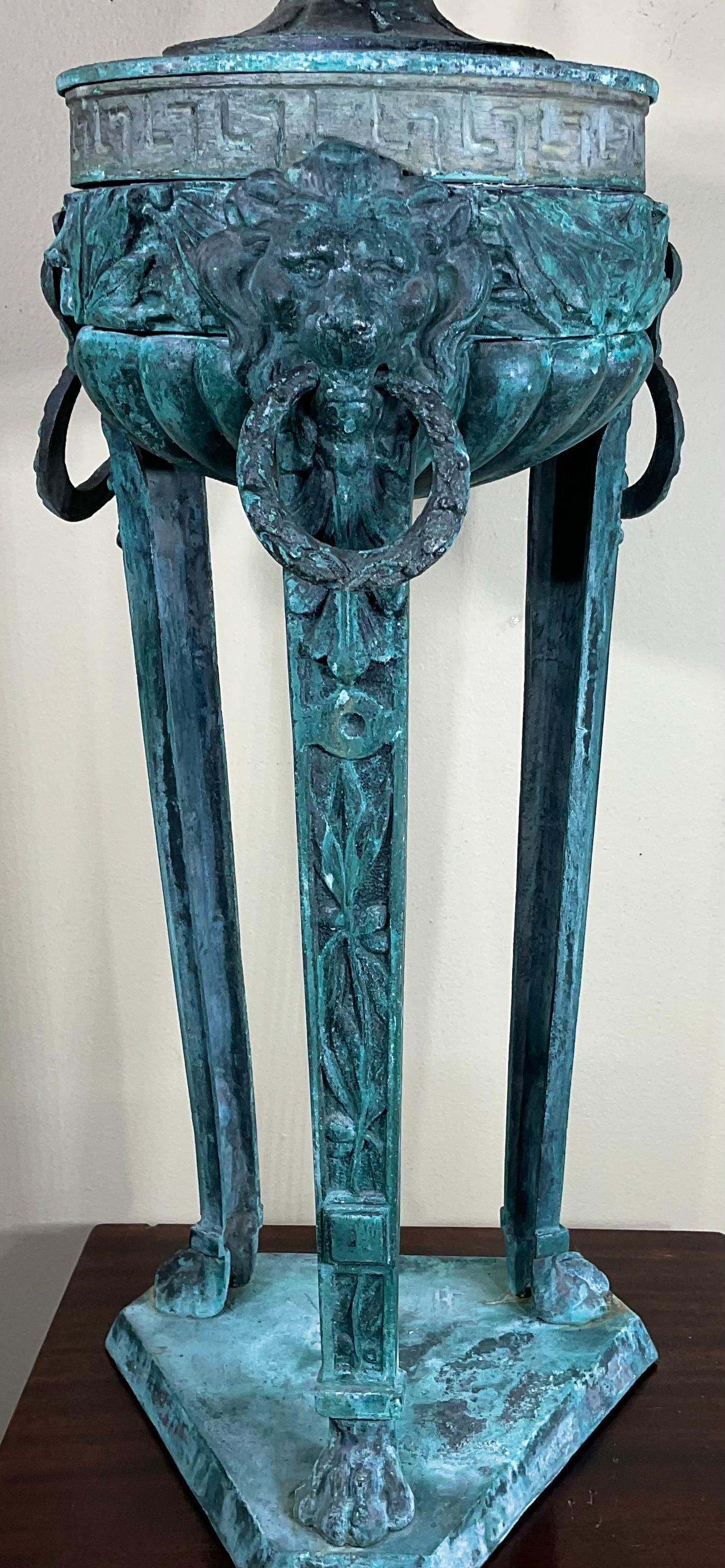 Exceptional antique French bronze architectural element used as decorative object of art. Beautiful oxidized green-turquoise patina, lion heads and vines Greek key motifs, one of a kind object of art for display.