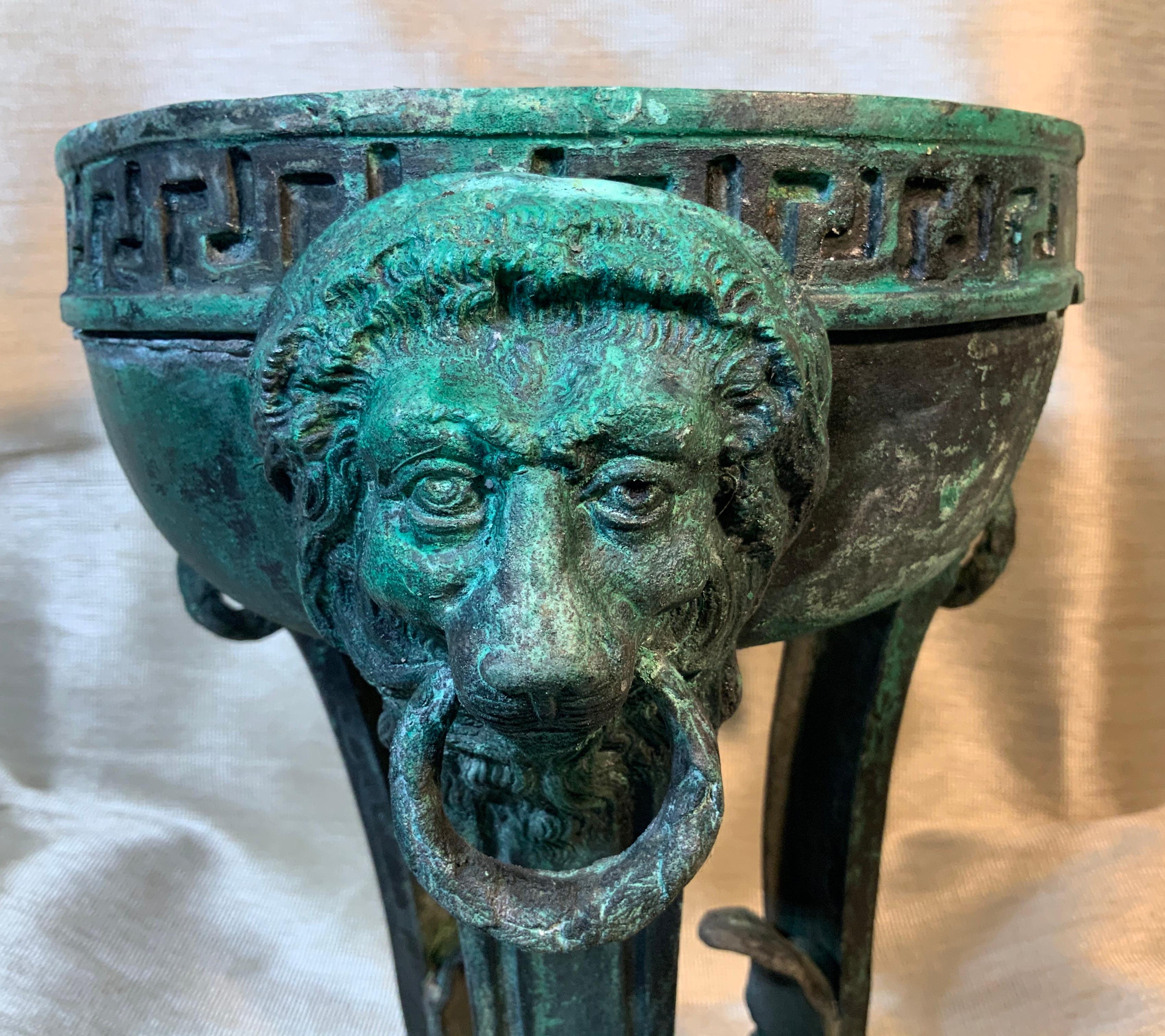 Exceptional antique French bronze architectural element used as decorative object of art. Beautiful oxidized green-turquoise patina, lion heads vine and Greek key motifs, one of a kind object of art for display.