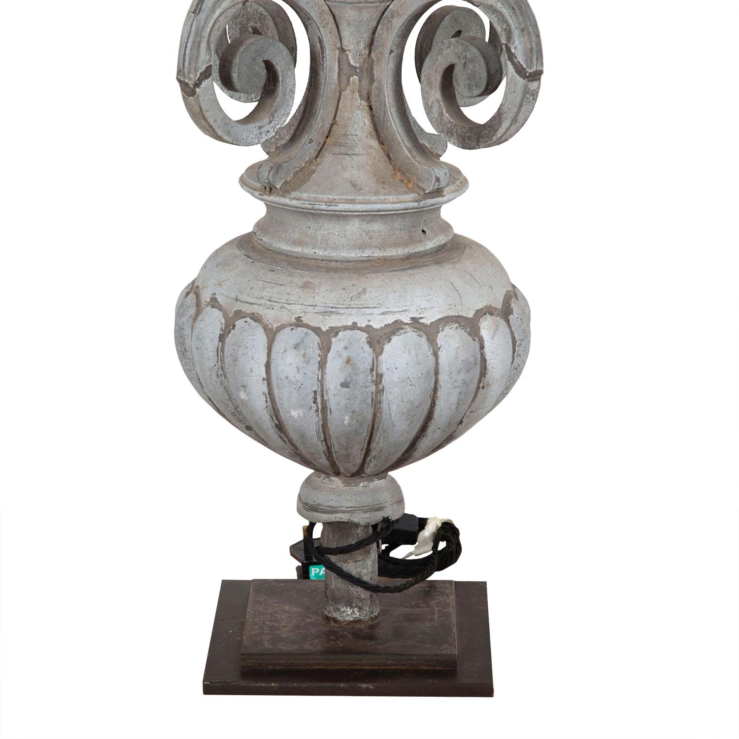 19th century zinc fragment converted into a decorative lamp. This piece has been rewired and PAT tested to UK standards.