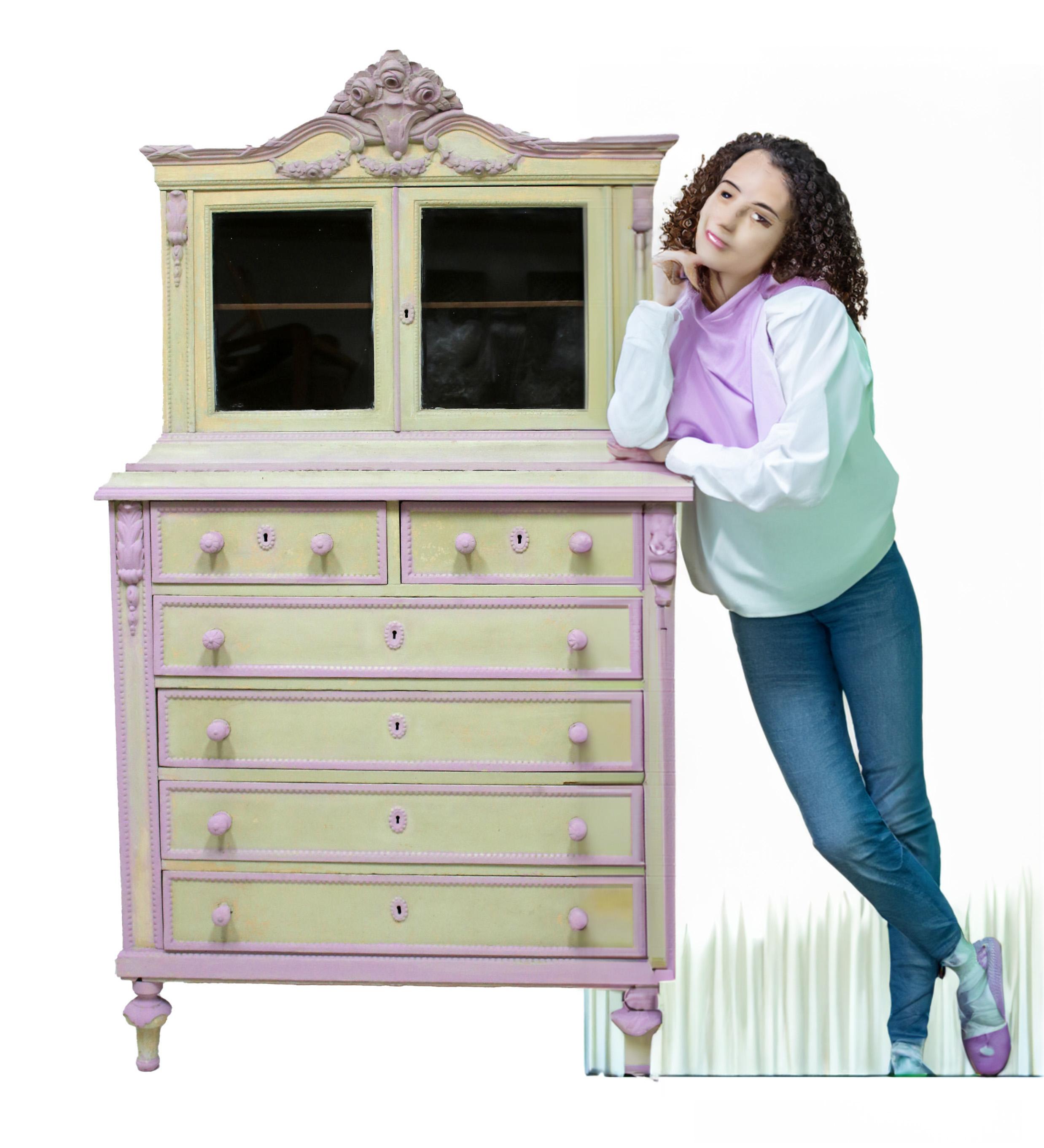 This is a one of a kind beautiful armoire suitable for a girls' room - it was originally custom made. It provides ample storage for clothes or underwear. The color theme also highlights it's girly vibe.