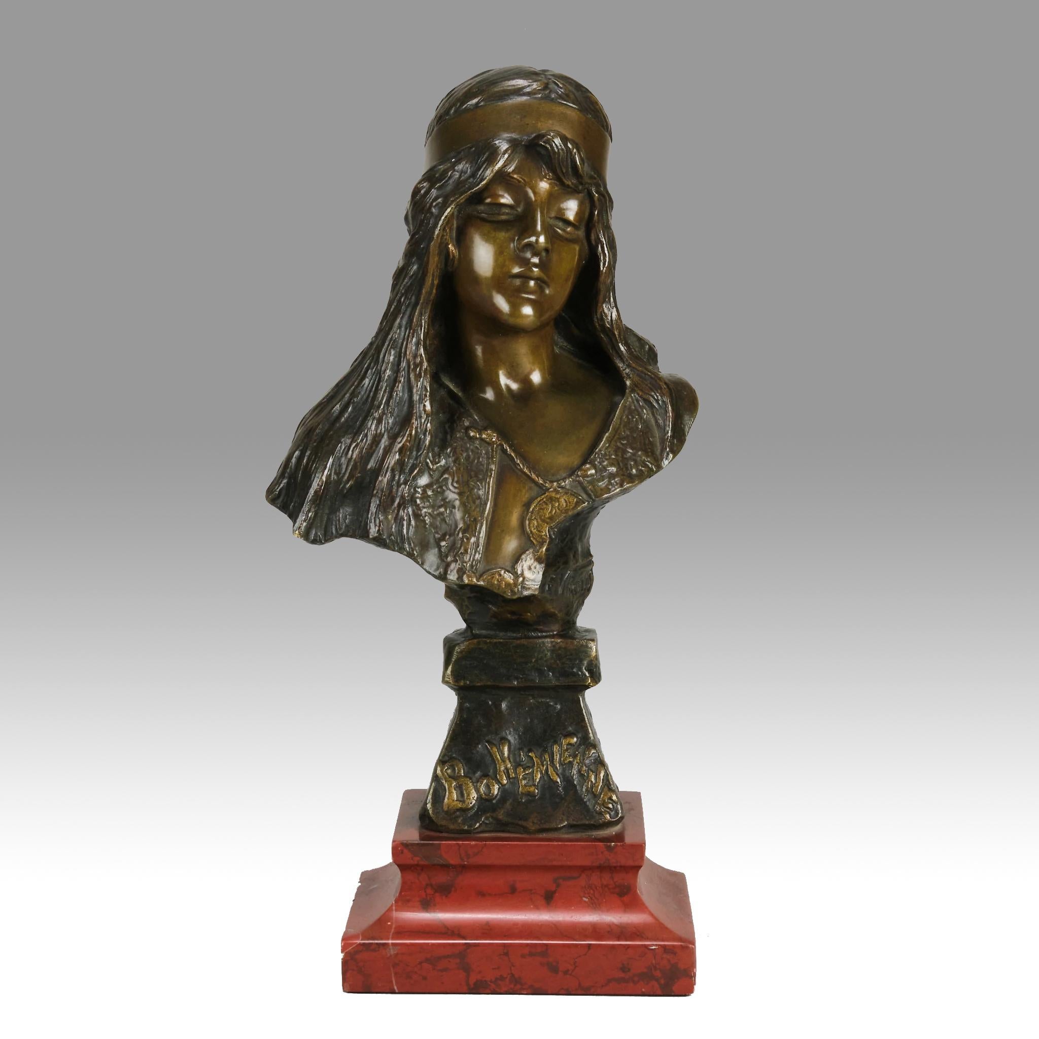 Captivating late 19th century French bronze bust of a beautiful woman, enhanced by the variegated rich brown patination and excellent tactile surface detail, raised on an integral bronze base with raised title to the fore. Signed ?E Villanis and