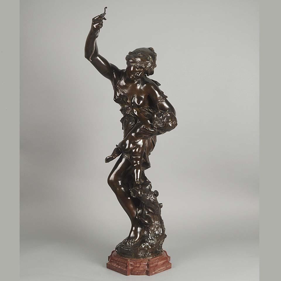 A very fine bronze study of Venus taking an arrow from Cupid her son, who at times would shoot his arrows without meaning or reason into the hearts of men, igniting their desire. Exhibiting excellent rich brown patina and good detail, signed Sul