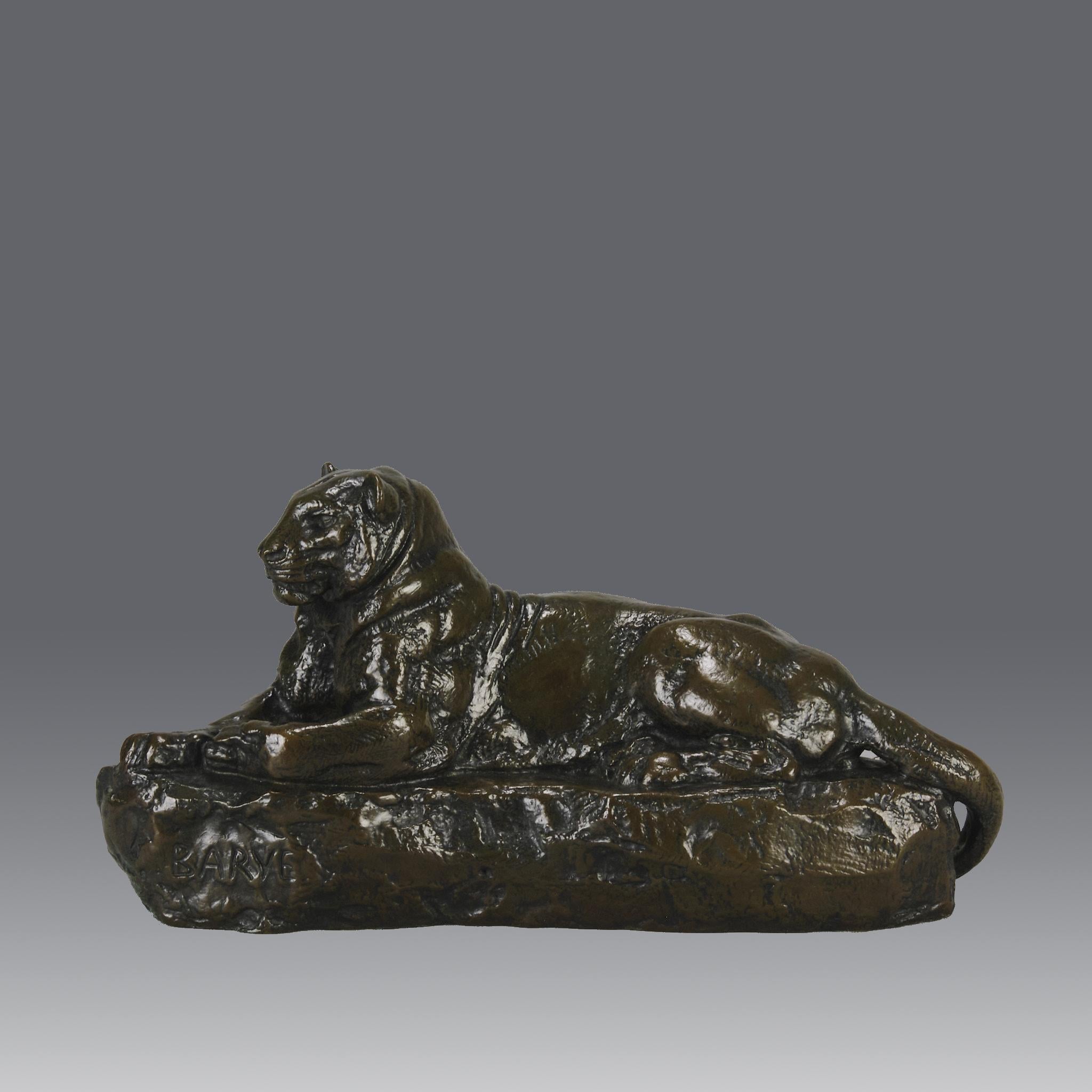 An excellent mid 19th Century French animalier bronze study of reclining panther with wonderful autumnal (green, orange, black and brown) patination and very intricate hand chased surface detail. Signed Barye and cast in the artist's own