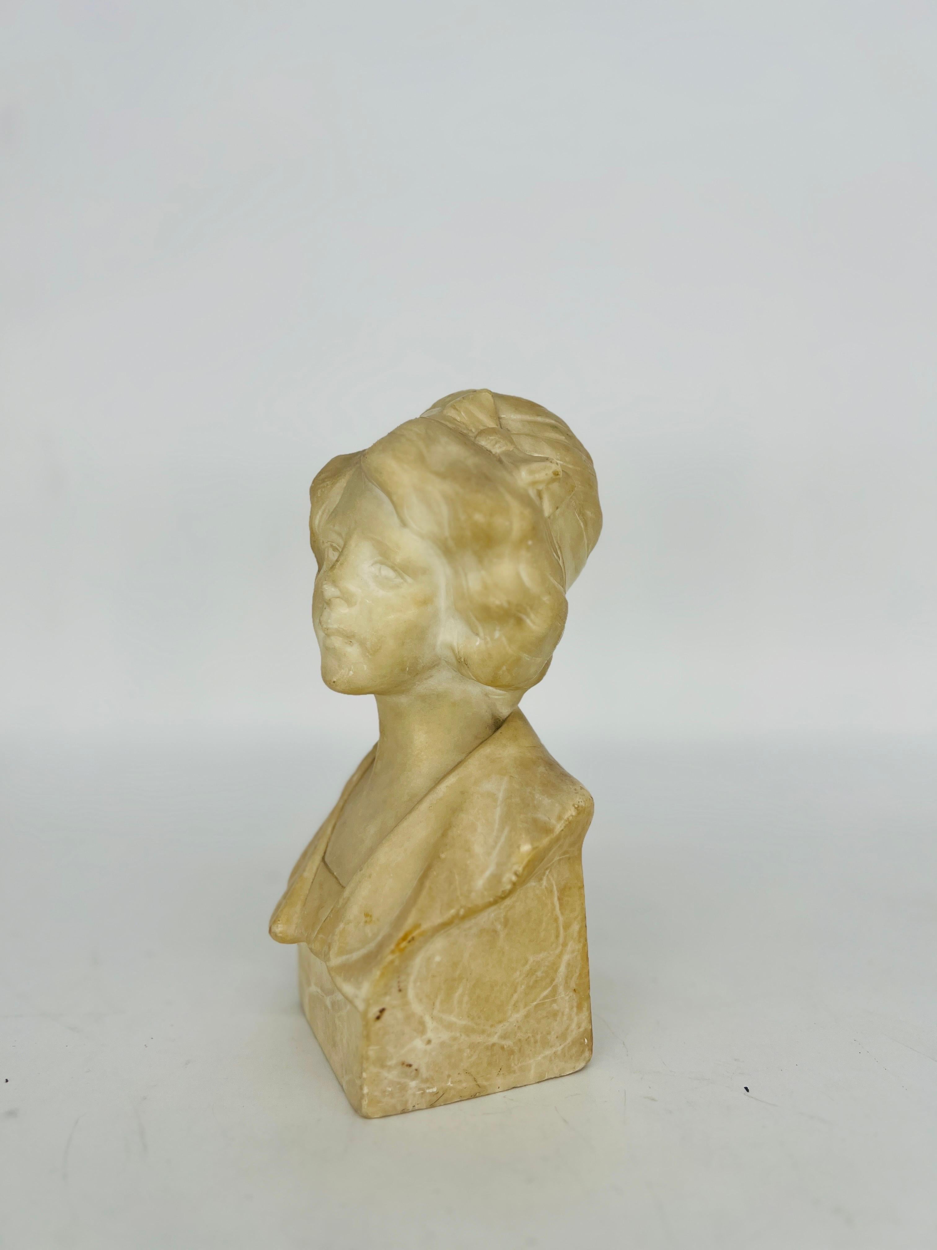 Likely French, 19th century.

An antique Art Nouveau era carved marble bust of a young lady. The marble presents very well and shows the true craftsmanship of the era. Signed to the verso 