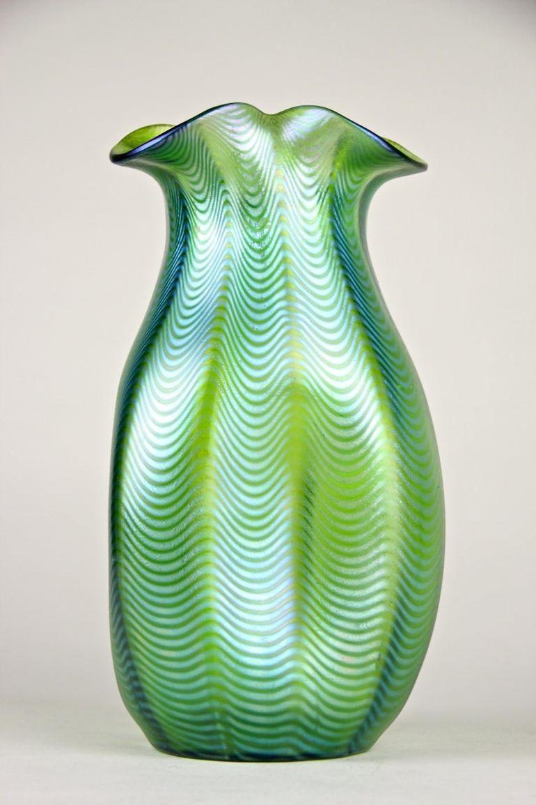 Outstanding, rare Art Nouveau glass vase created by the famous company of Loetz Witwe in Klostermuehle/ Bohemia around 1898. This absolutely fantastic looking, large Loetz collector´s vase comes in the renowed decoration called 