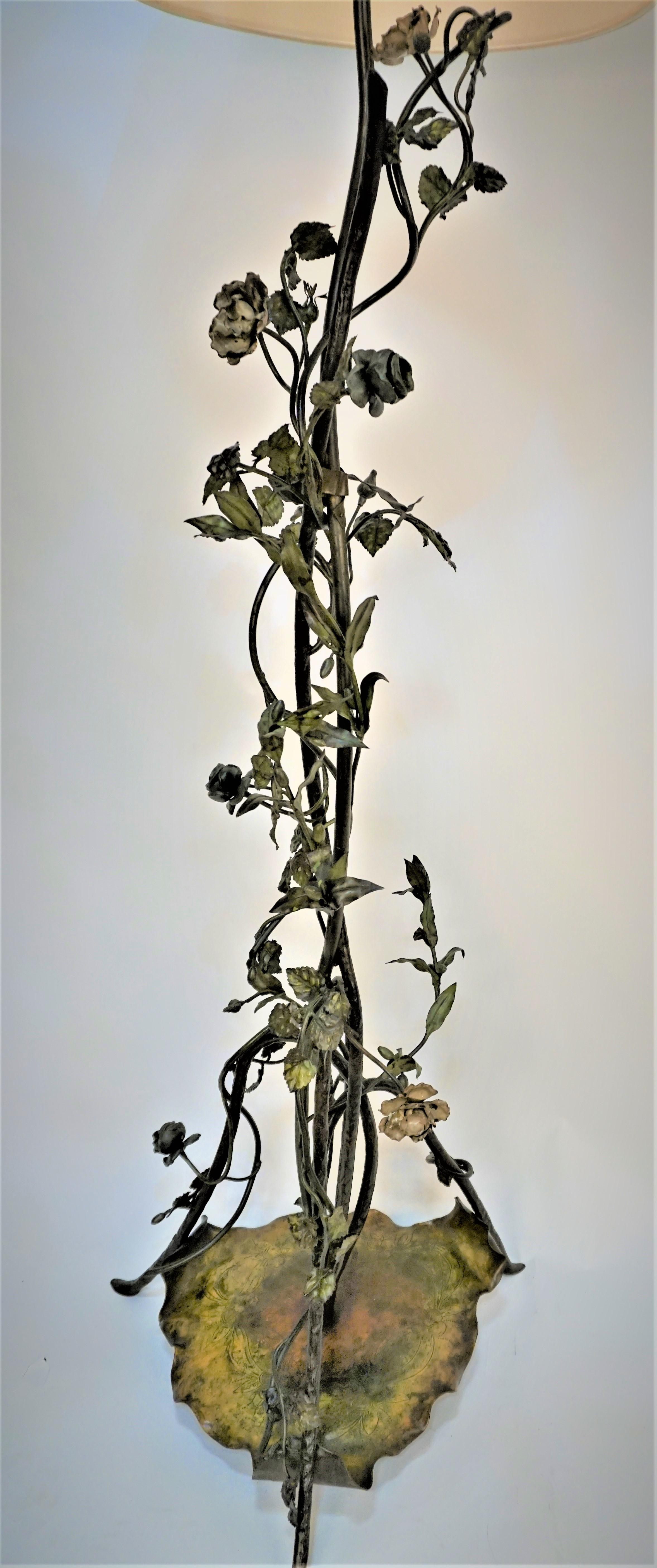 19th century painted and patinated bronze tall rose/flower plant oil floor lamp that has been modified and electrified with double pull chain socketed and fitted with silk lampshade.
Professionally rewired, 200watts max each light.