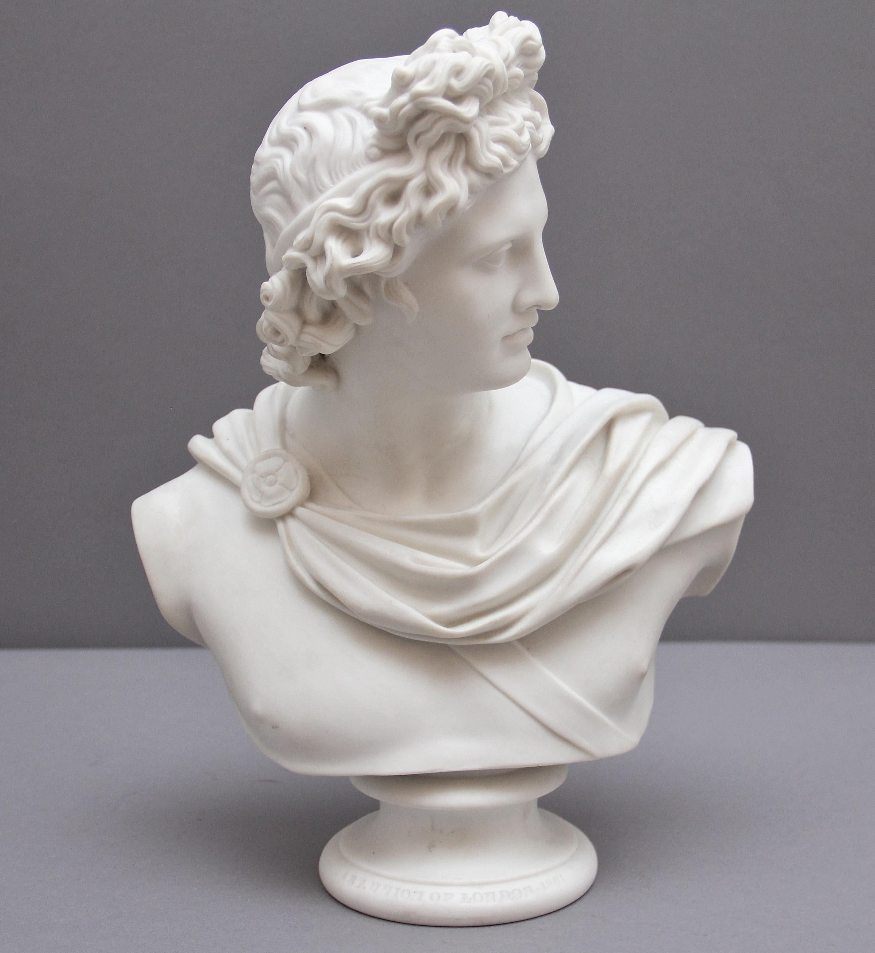 19th Century Art Union of London parian bust of Apollo modelled by C Delpech dated 1861, his head is looking to the right, draped across one shoulder fastened by a medallion, on socle base.
 