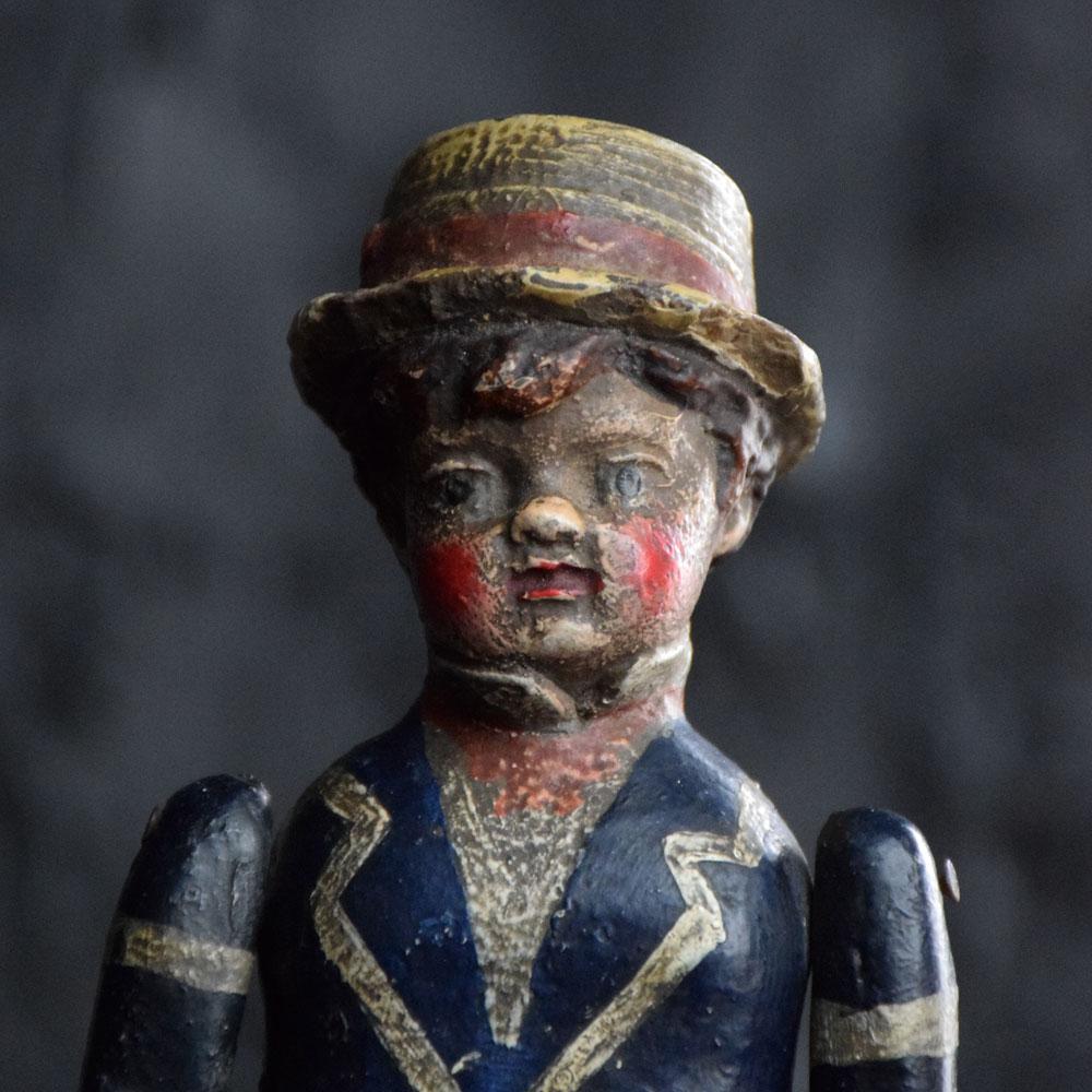 19th century articulated automaton doll 
We are proud to offer a highly collectable and rare example of a late - 19th century English Folk Art, fully articulated hand carved wooden automaton doll figure. In the form of a small boy, this doll would