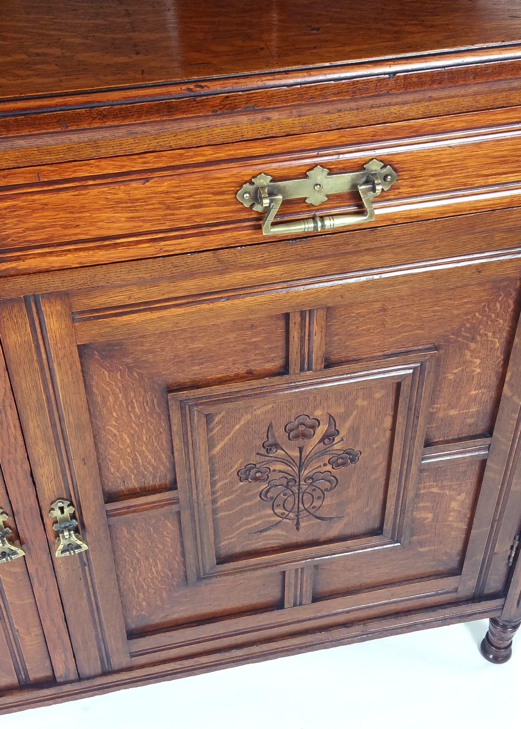 Arts and Crafts 19th Century Arts & Crafts English Oak Sideboard with Sunflower Detail