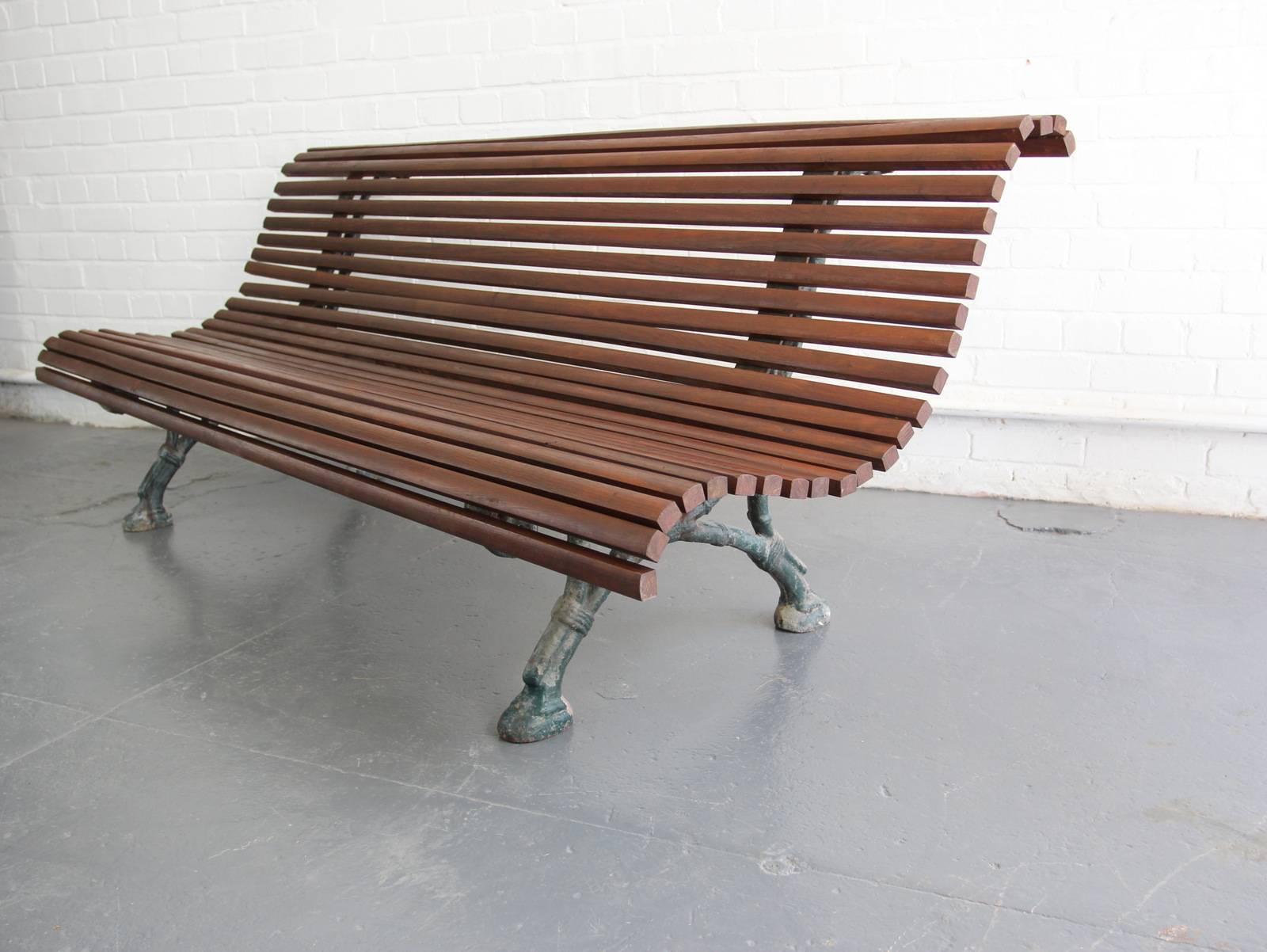19th century Arts & Crafts French park bench

Product code #OA528
- Teak slats
- Beautiful curved design
- Cast iron legs
- French, circa 1880s
- Measures: 201 cm long x 76 cm deep x 85 cm tall
- 38cm from floor to seat

Condition
