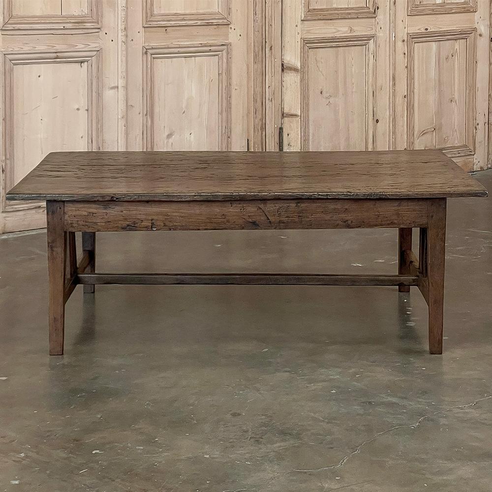 19th century Arts & Crafts Rustic Chestnut Coffee Table was hand-made during an intriguing period of European furniture lore. The Arts and Crafts movement was an international trend in the decorative and fine arts that developed earliest and most