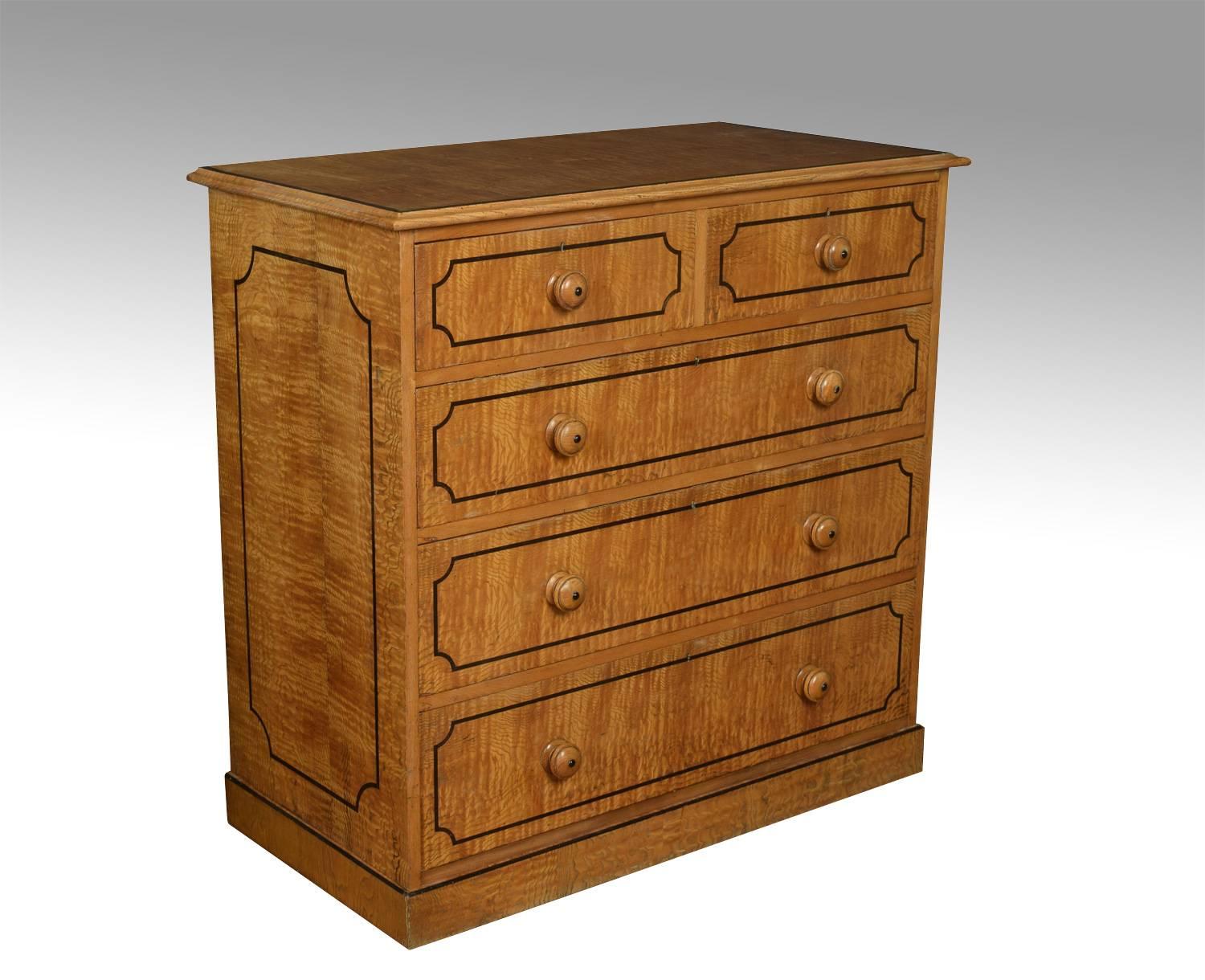 19th century ash chest of drawers, the large rectangular top with ebony banding above two short and three long graduated draws with turned handles and mahogany liners all raised up on plinth base

Dimensions:
Height 41.5 inches,
width 42
