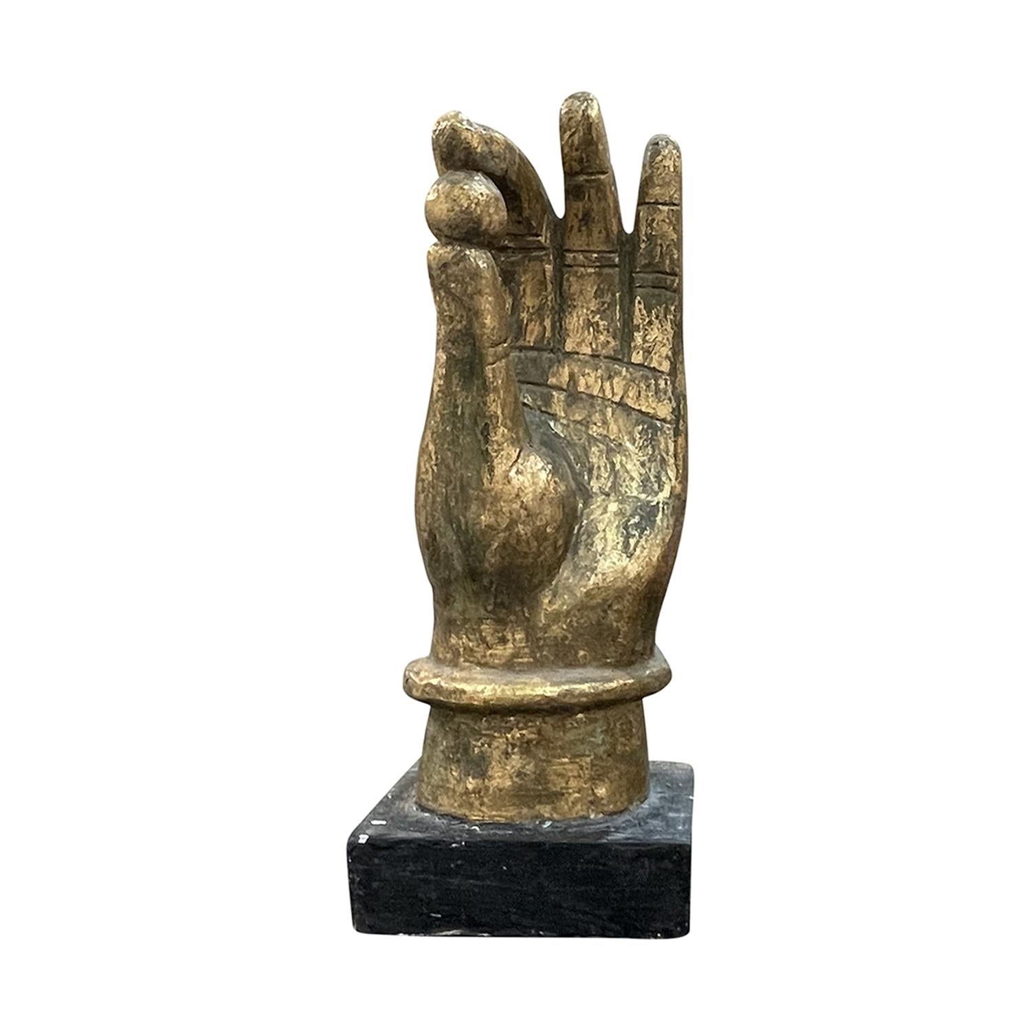 A single, antique Asian tropical wood hand, the pearl of wisdom ornament, in good condition. The pearl was a symbol of the most valuable treasure, wisdom. This ornament will add charm to any home. Minor fading due to age. Wear consistent with age