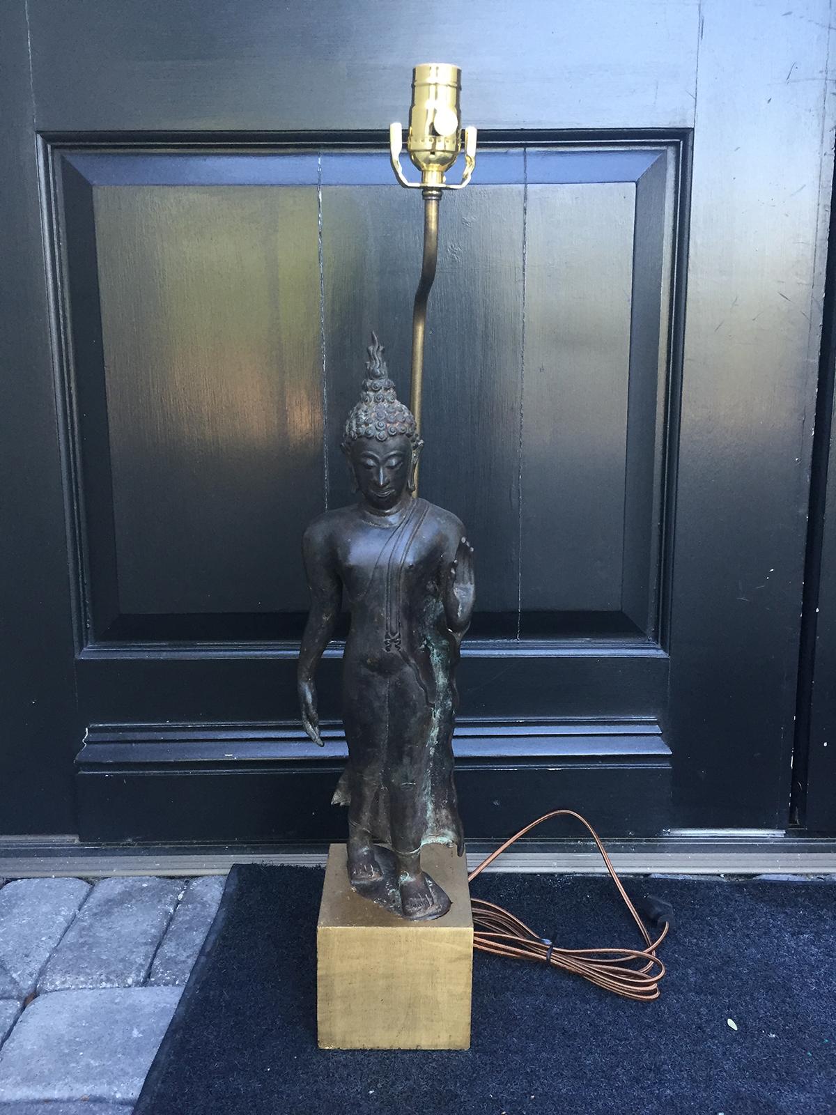 19th century Asian bronze figure as lamp on custom giltwood base
New wiring.
