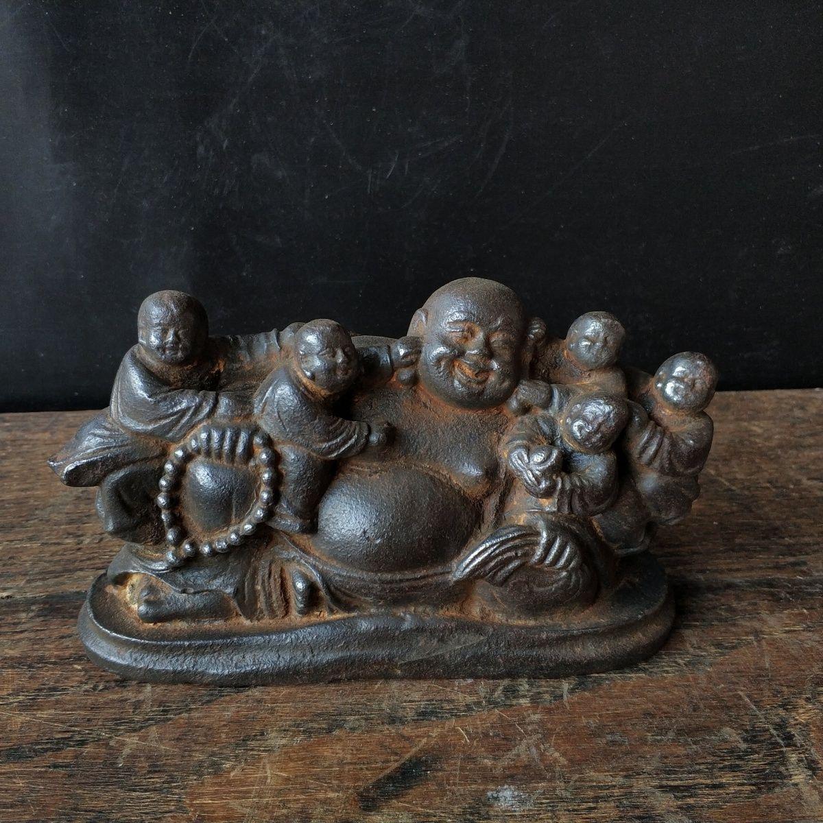 Experience the profound symbolism and grace of this 19th Century Asian Buddha Hugging by Five Kids Statue, a truly rare and heartwarming representation of compassion, joy, and enlightenment. Expertly crafted from high-quality materials, this antique