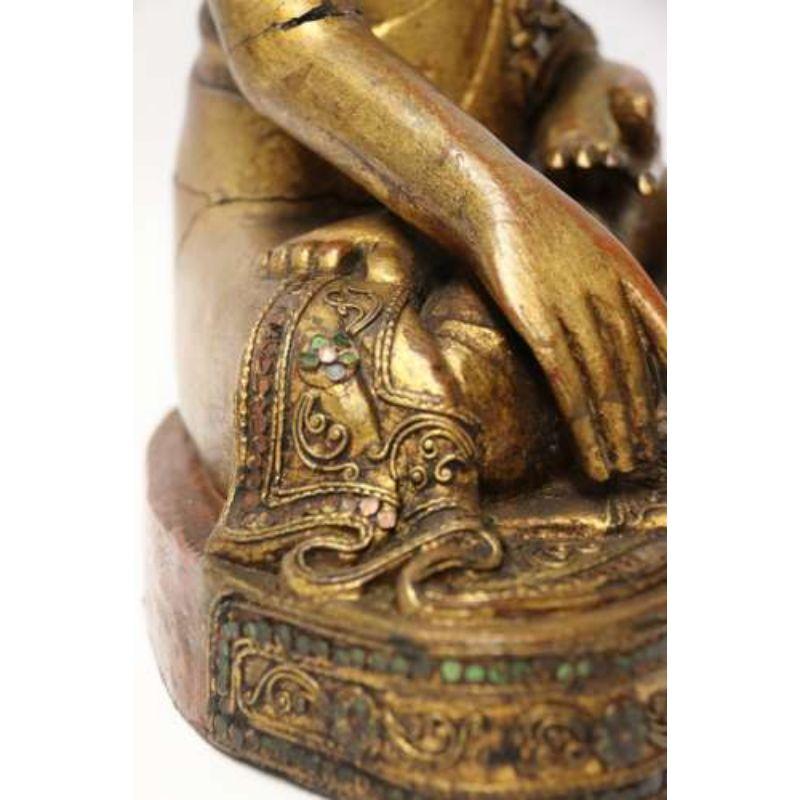 Hardwood 19th Century Asian Carved Gilt Wood Buddha, with Inlaid Glass Eyes, circa 1900 For Sale