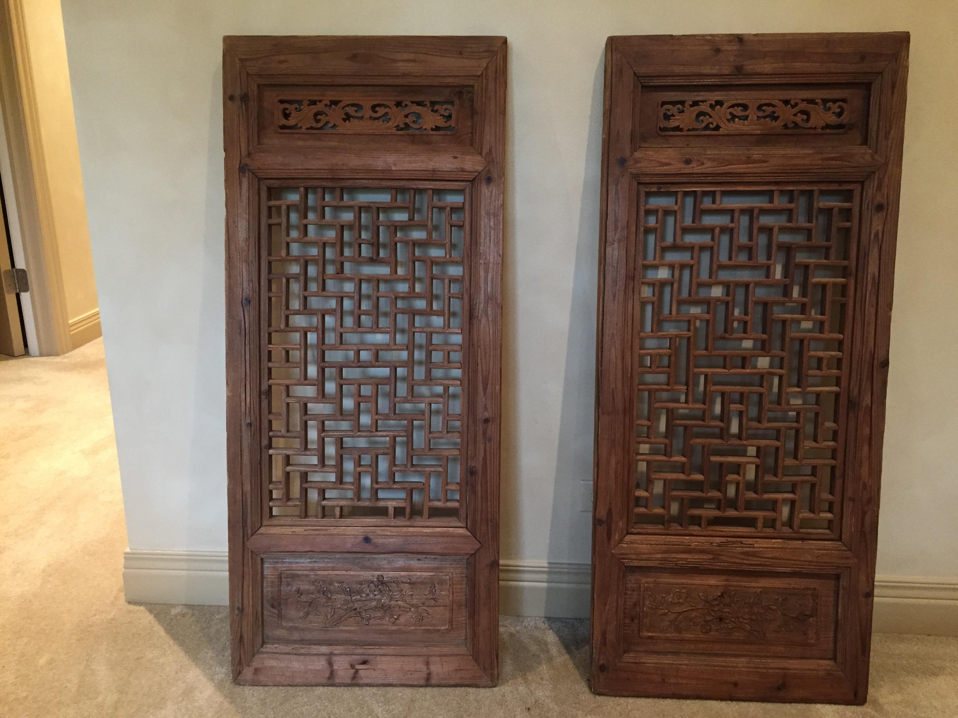 Part of a large collection of artifacts from our many trips to Asia -
these antique teak shutters have been gracing our home since 1971
weathered a beautiful brownish, gray, carved and detailed
one of a kind.

Dimensions: 19.5