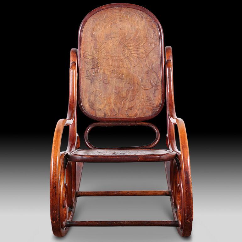 A late 19th century bentwood rocking chair with Victorian pressed designs to the seat and back. Traces of old label on bottom with ‘Austria’ showing. Likely manufactured by either Thonet or Josef Kohn, circa 1880.


  