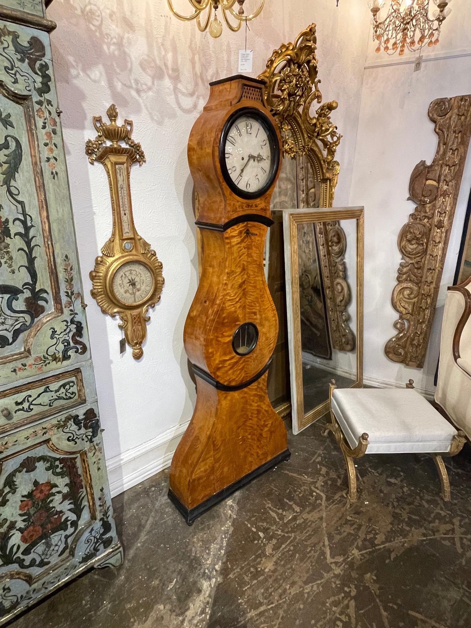 Handsome 19th century Austrian Biedermeier crotch maple grandfather clock. Beautiful wood grain and ebonized details. Very special!