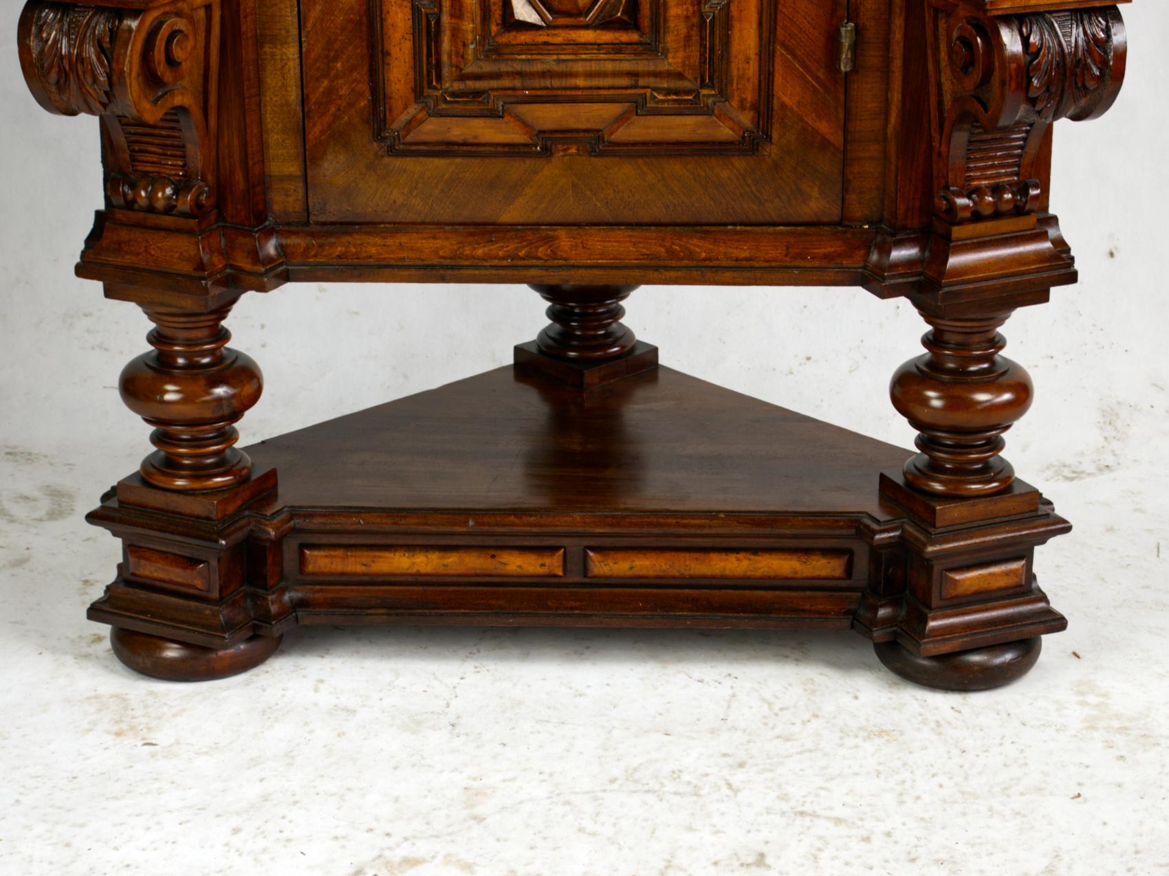 Gorgeous 19th century antique Austrian tall hand carved corner cabinet. The cabinet was part of the original equipment of Fészek Artists’ Club established in 1901 in Budapest.
The cabinet is fully restored.