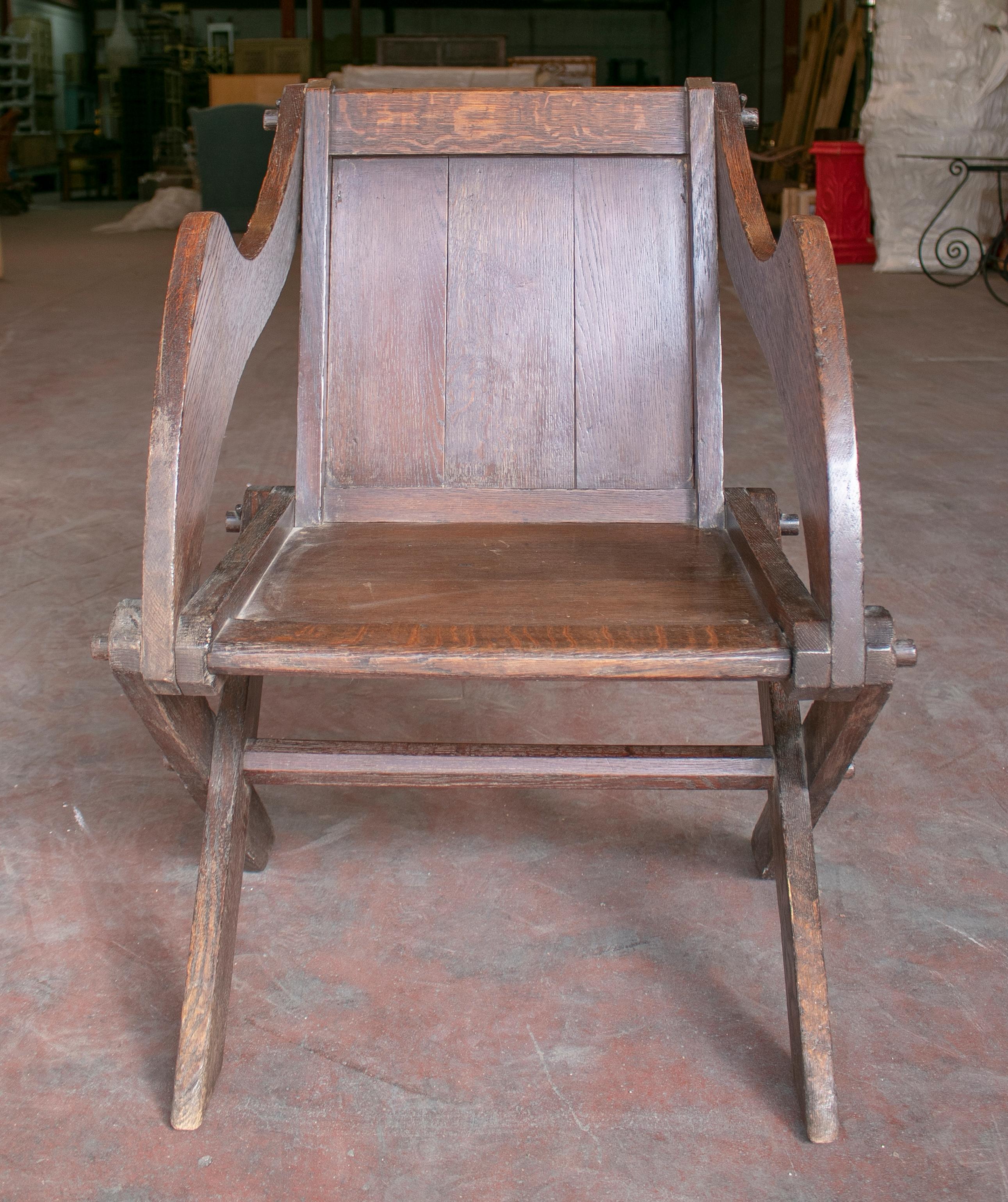 Antique 19th century Austrian hand carved oak armchair.