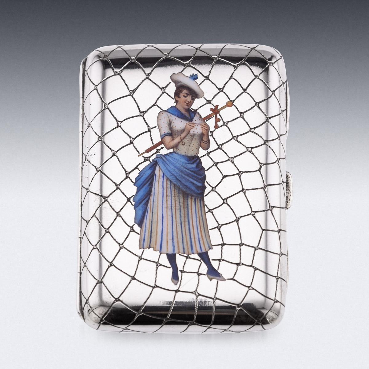 Antique 20th century Austrian solid silver cigarette case, of typical rectangular form, very unusual design chased imitating crocodile leather and enamelled depicting a lady of leisure, holding a pencil and an umbrella, applied with gold initial to