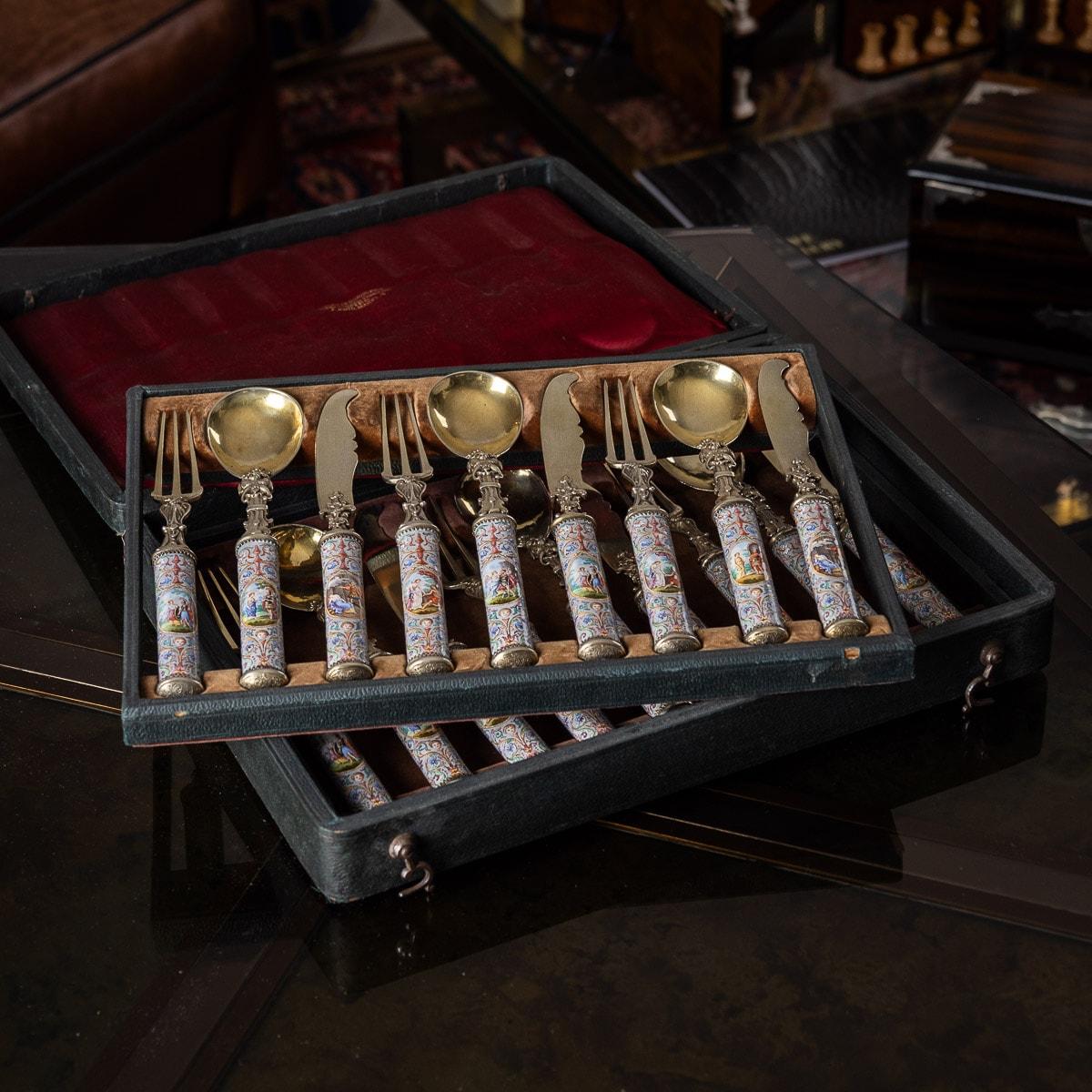 Antique late-19th century Austrian solid silver-gilt and hand painted enamel cutlery set for 6 person, highly decorative and elaborate cast silver-gilt mounted cutlery, set with beautifully hand enameled handles depicting romantic scenes in the