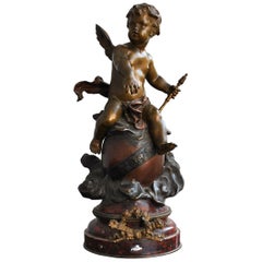 « Baby Riding the Earth » (le bébé chevauchant la terre) Bronze de Lon Pilet, XIXe siècle