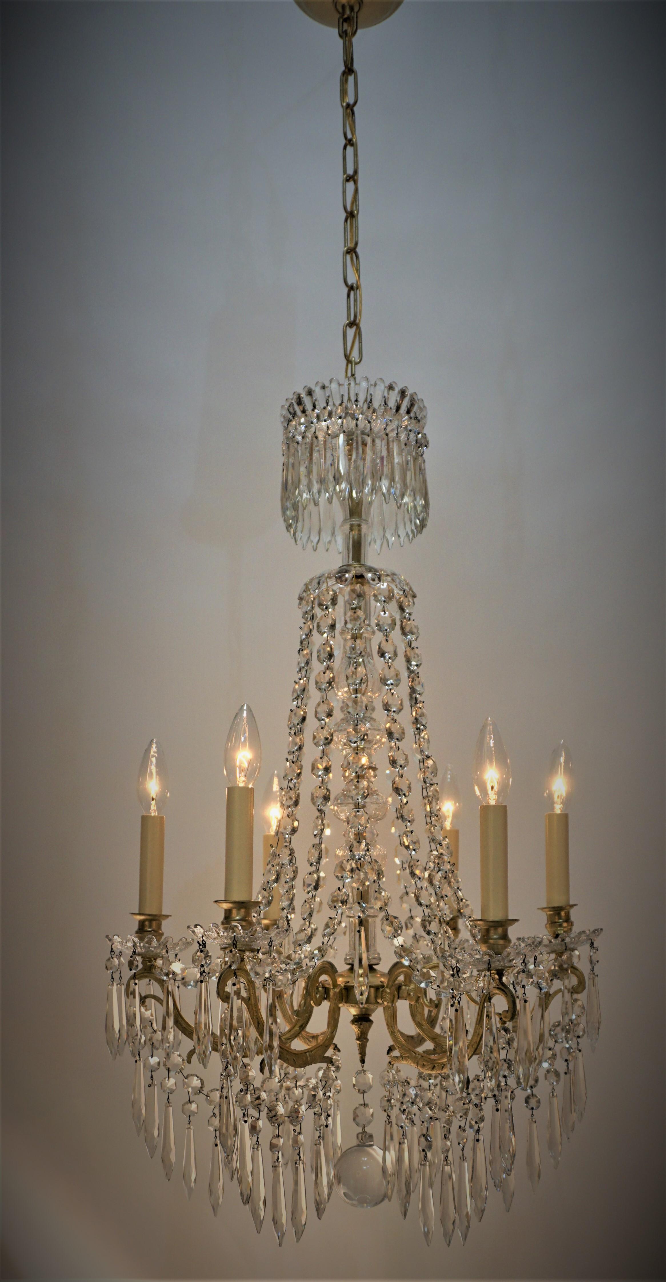 Beautiful six light 19th century candlelight crystal and bronze chandelier that has been professionally electrified. 
Measurement: width 20