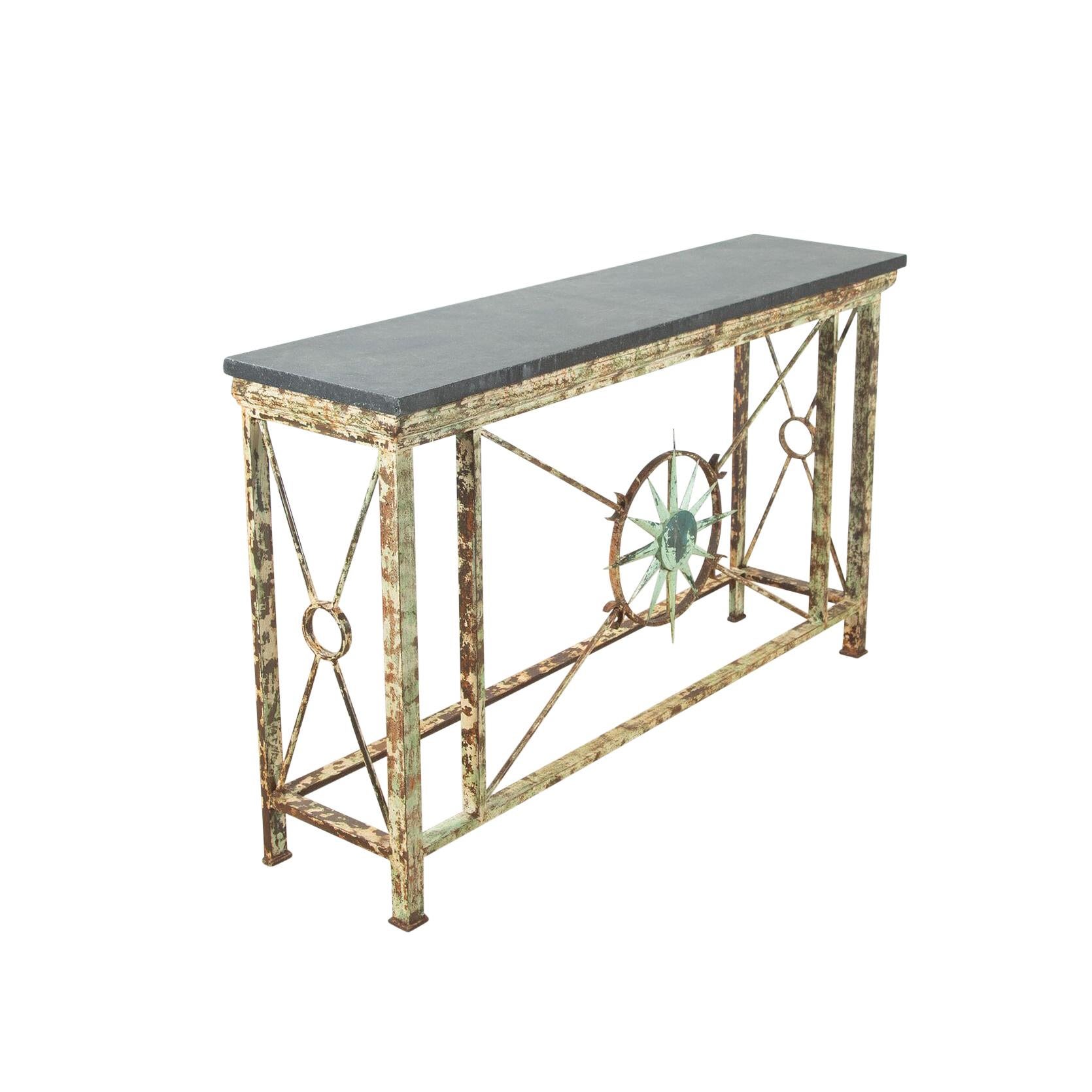 19th Century wrought iron balcony converted to a console. 
In a classical star burst design with a Belgium blue slate top.