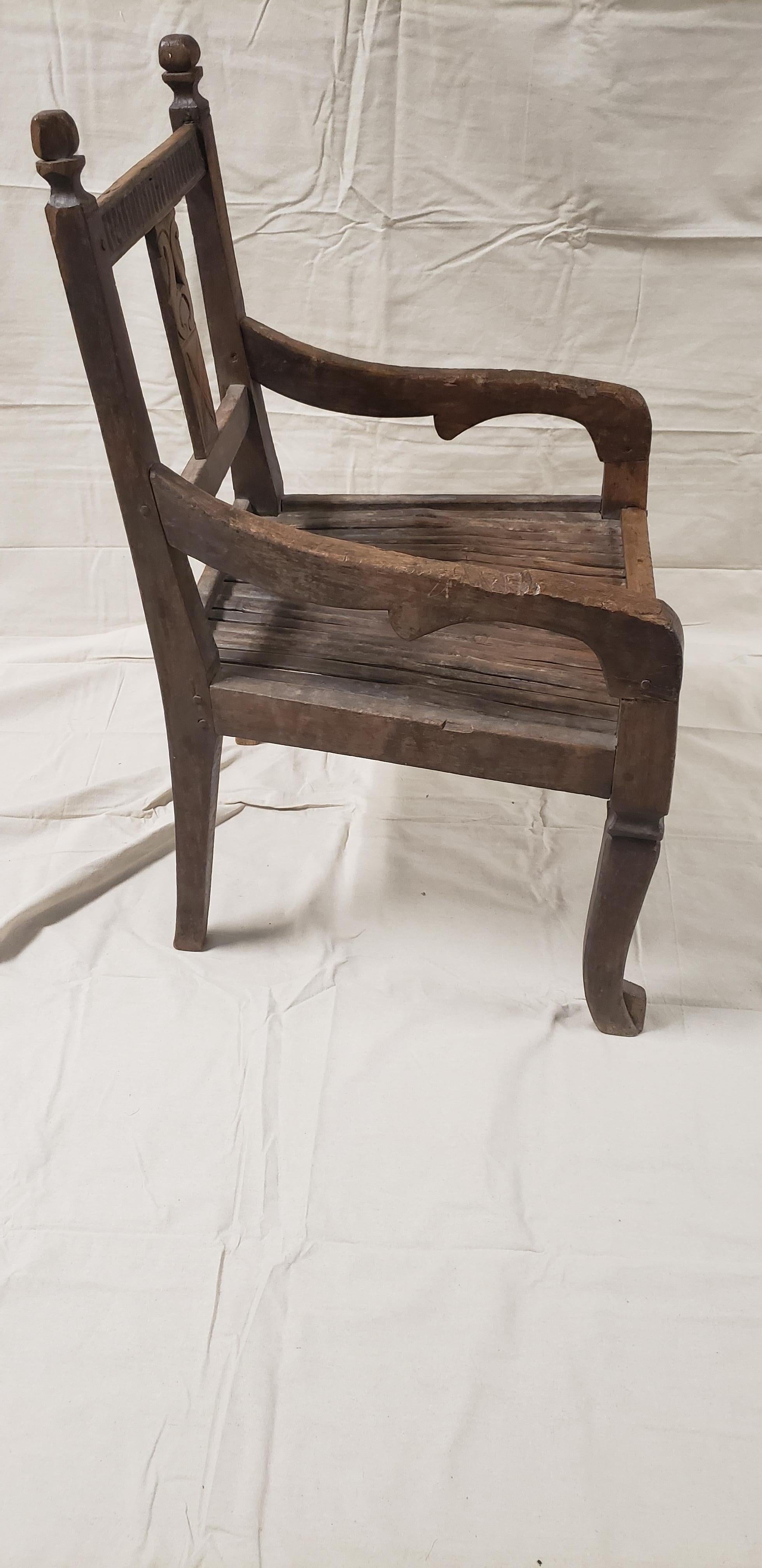 Carved 19th Century Balinese Throne Chair with Cane Seat