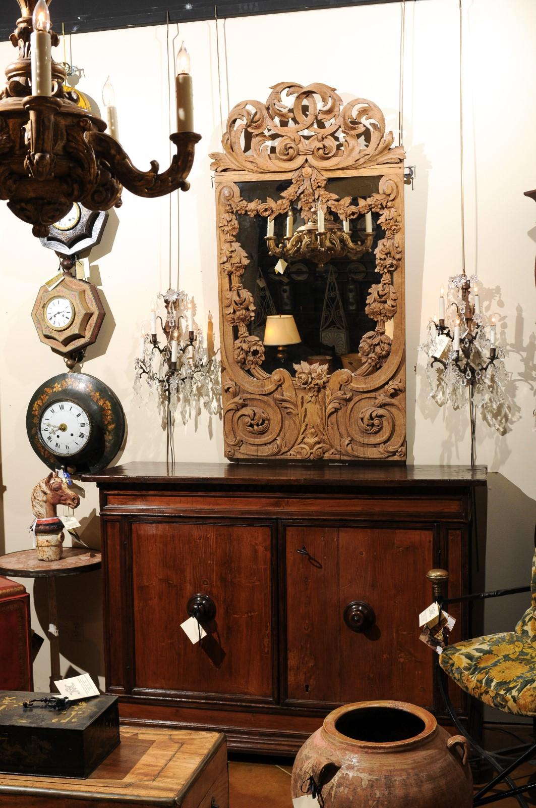 Carved 19th Century Baltic Region Oak Mirror with Pierced Crest and Scroll Design For Sale