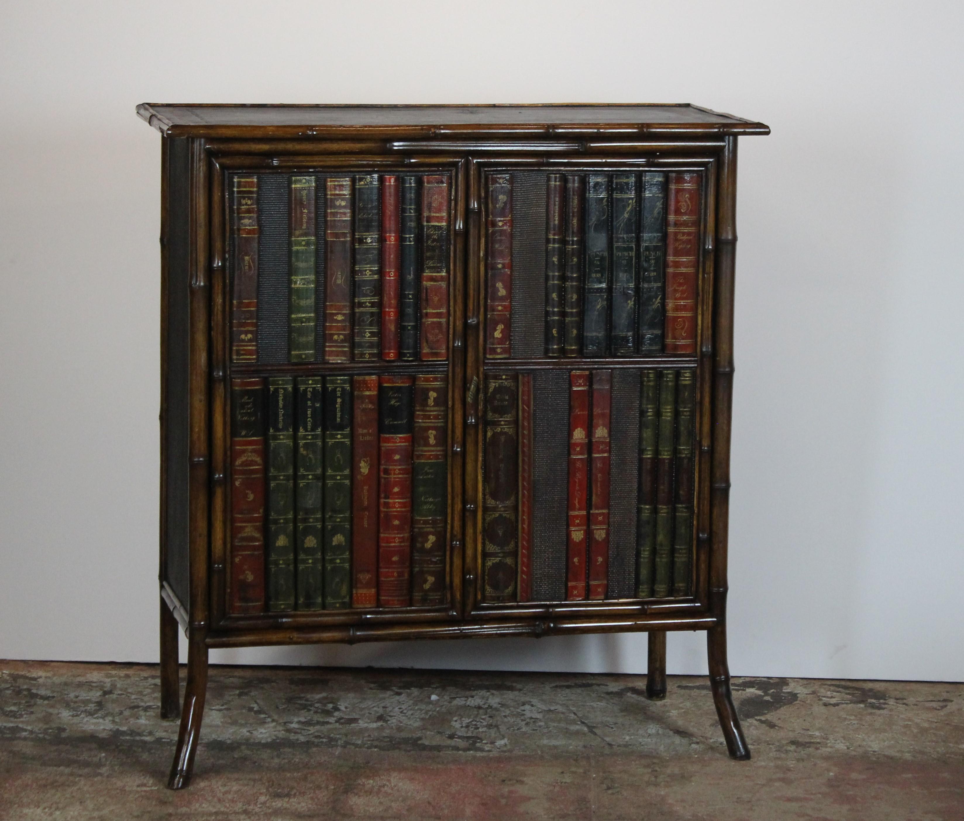 19th century French bamboo cabinet. The doors have faux leather books and a single shelf.