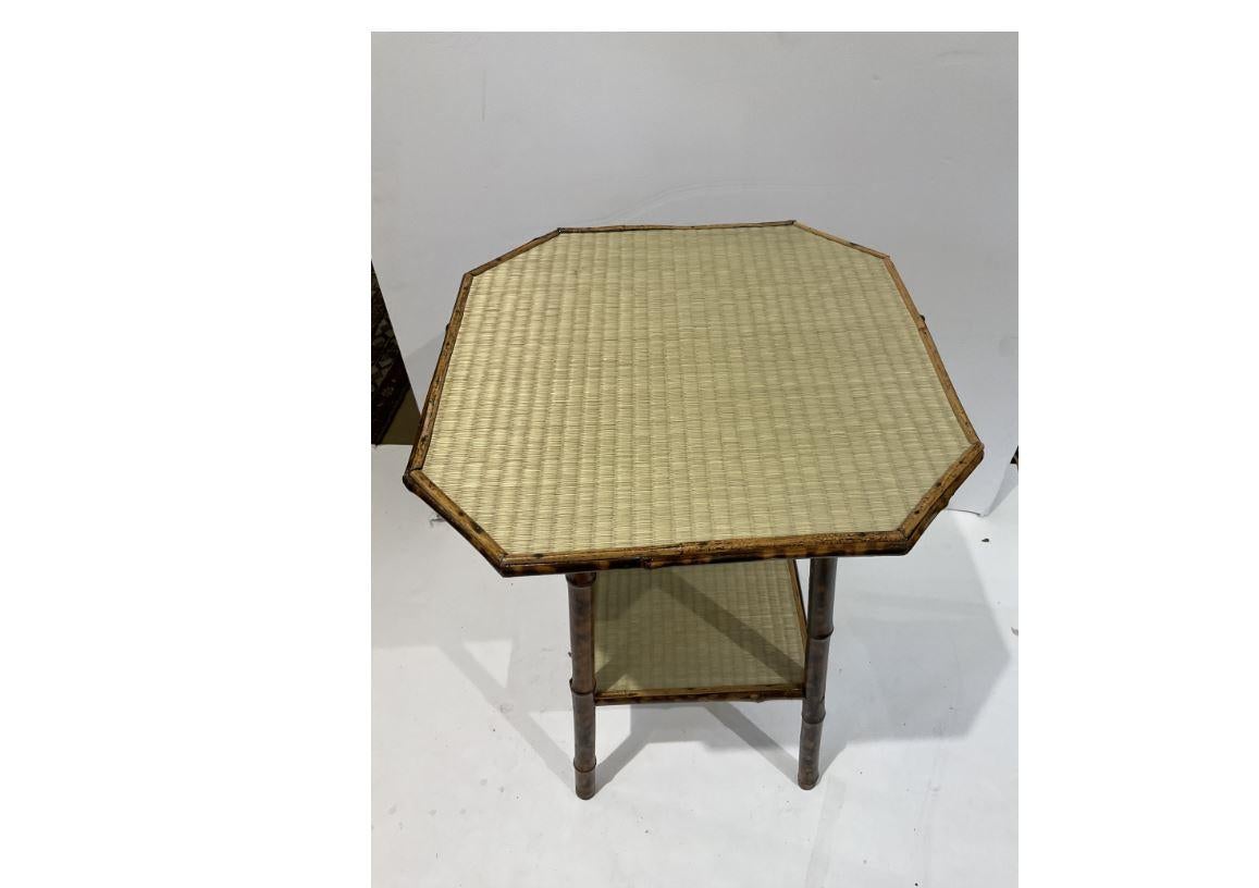 Here we have a beautiful 19th century accent table. The English bamboo has lovely natural designing that meshes will with multiple styles and colors. This is a great transitional piece and would make a great addition to any room in the house!