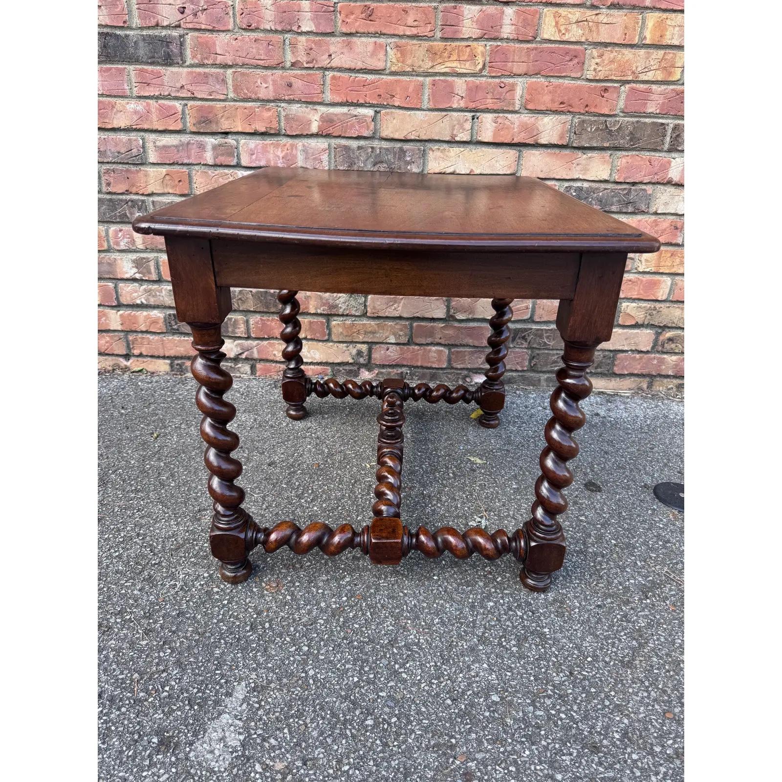 This beautiful side table is ready to go to your living space! Coming from France under the reign of Louis XIII, this little table is tiny but mighty after nearly 200 years of use. The beautiful barley twist legs provide style and sustenance for