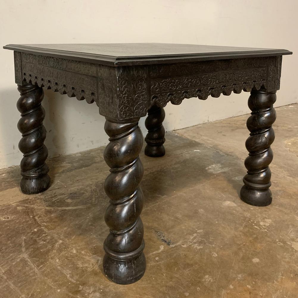 19th century barley twist square end table was handcrafted from sold oak, and features a subtle apron treatment around the entire facade, accentuated by the bold spiral of the barley twist legs. Rare to find in a square configuration,

circa