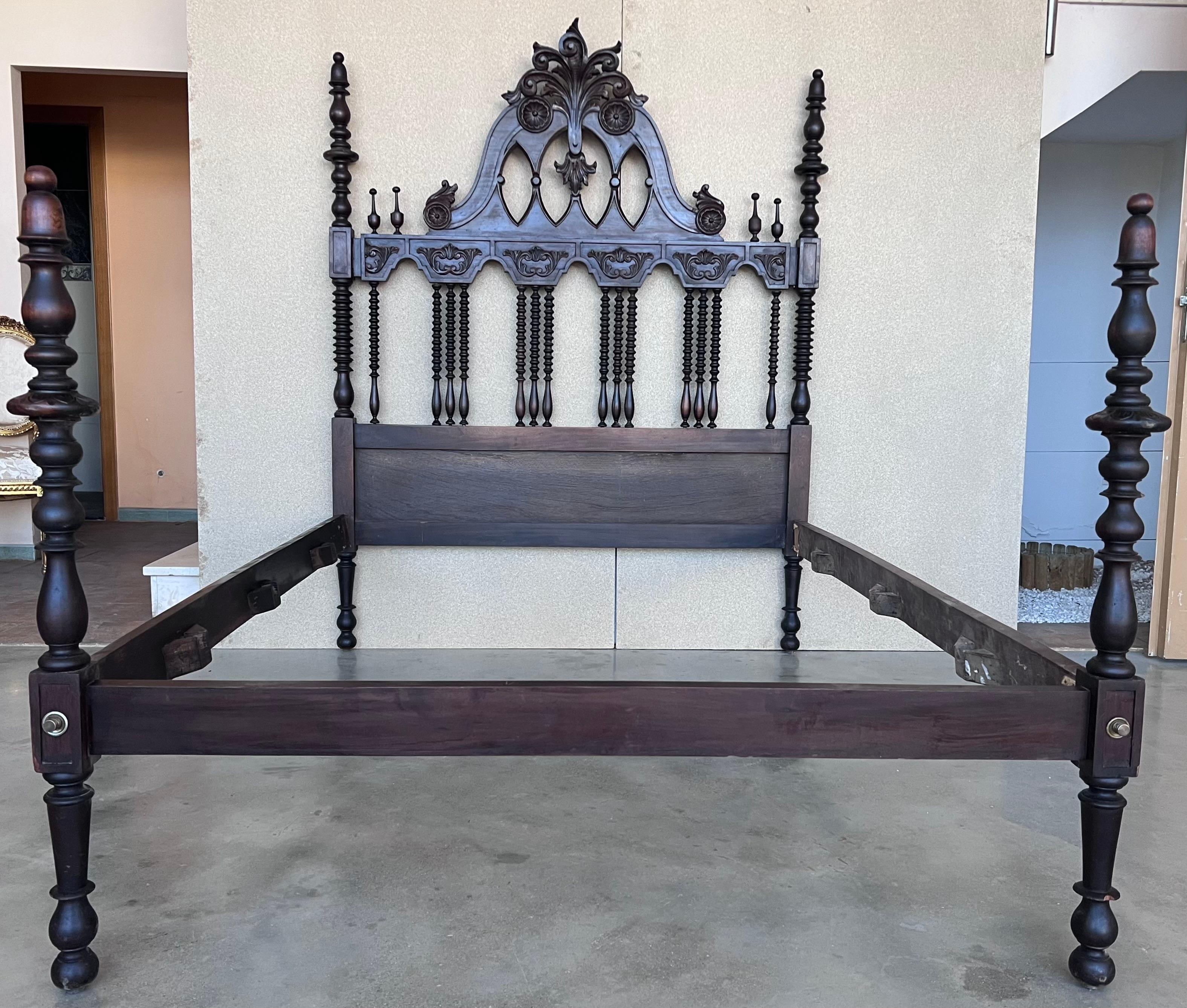 19th Century baroque bed, original Spanish bed.

This queen size 4-poster bed is hand carved with elaborate details, spiral turned post, 3D open spiral twist spindles, and moorish details represented by the repetition of arches. It is carved and