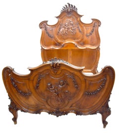 19th Century Baroque Louis XV Style Bed in Walnut Carved with Putti