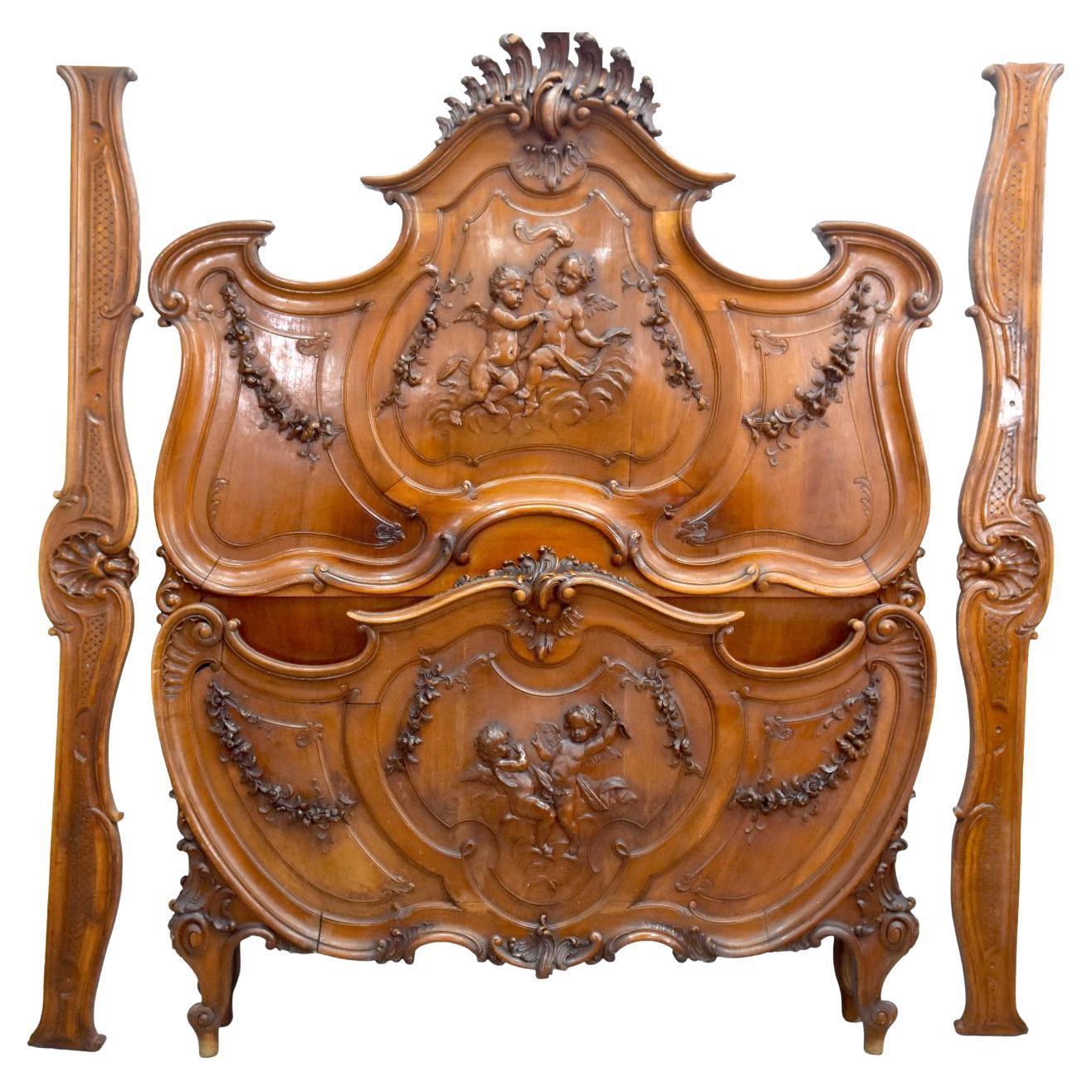 19th Century Baroque Louis XV Style Bed in Walnut Carved with Putti