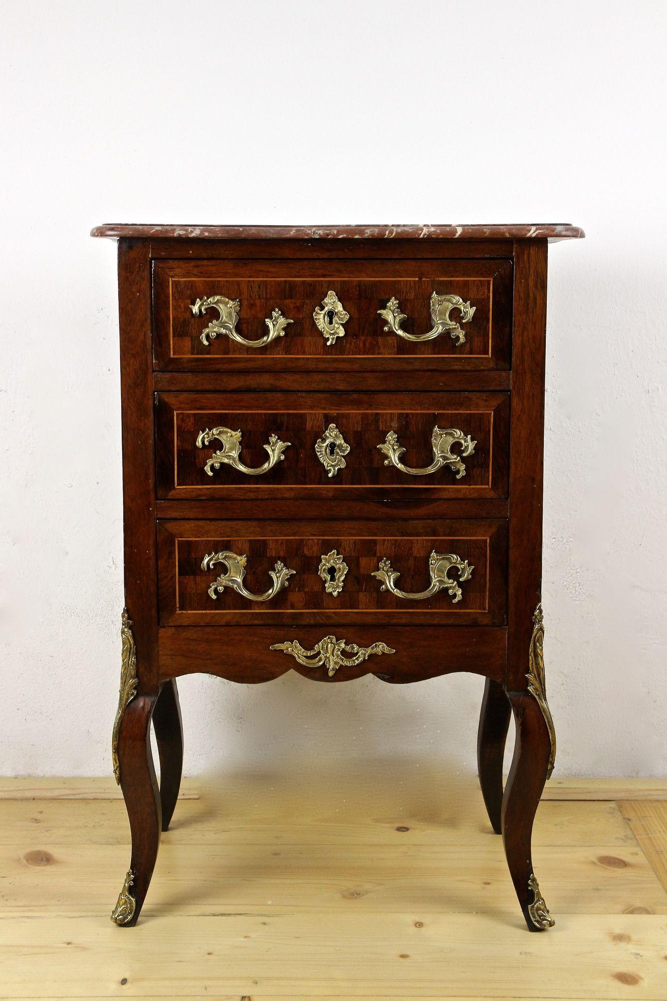 Lovely petite mahogany chest of drawers from the Baroque revival period in France around 1880. A unique designed, great sized chest made of spruce and artfully veneered with fine mahogany wood. This dresser from the late 19th century - the so-called