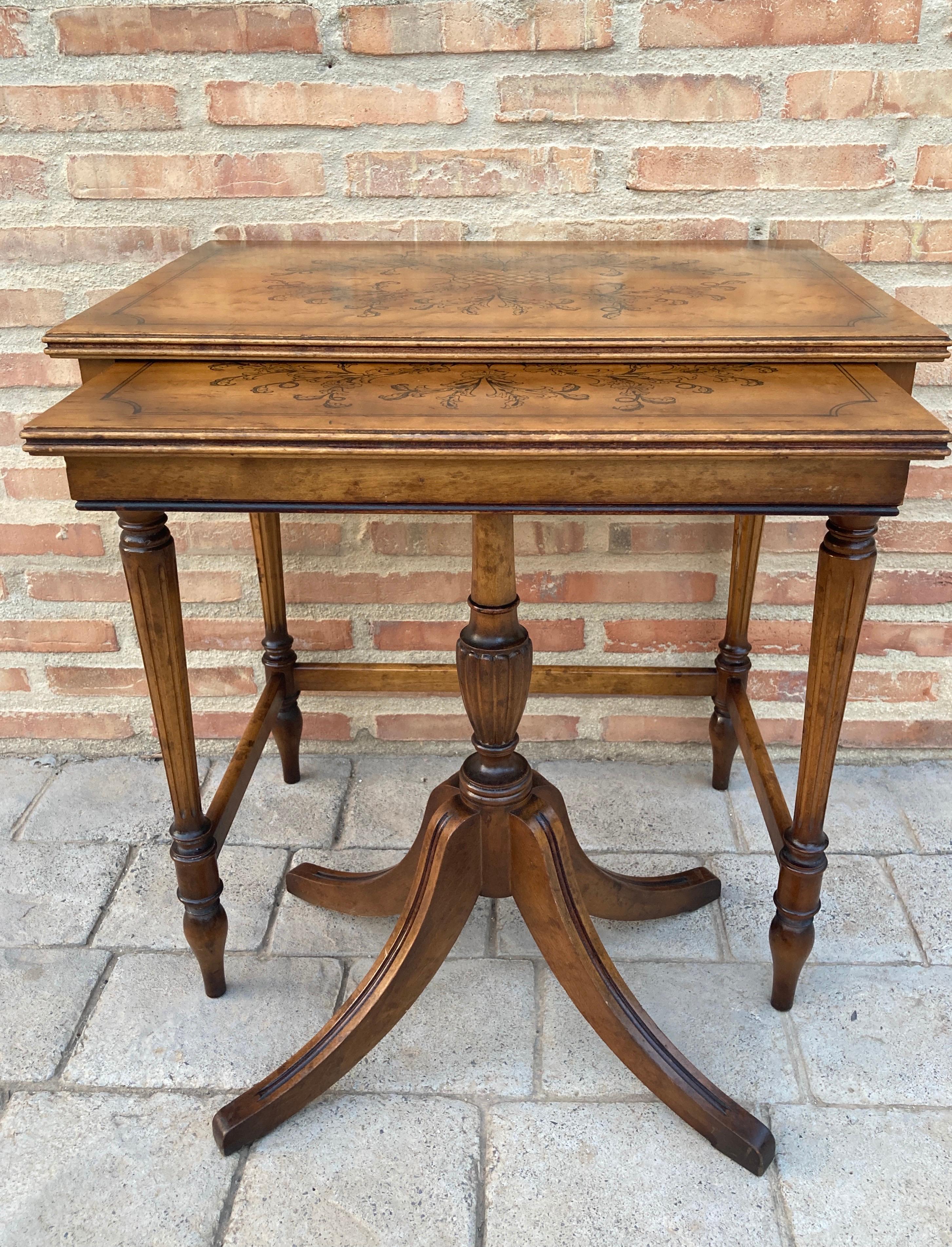 19th century Spanish trestle table in walnut. This piece has a large scale, beautiful turned legs and a beautiful marquetry top that combines different hues of walnut color. This table can be used as a console, side table, nightstand, or small