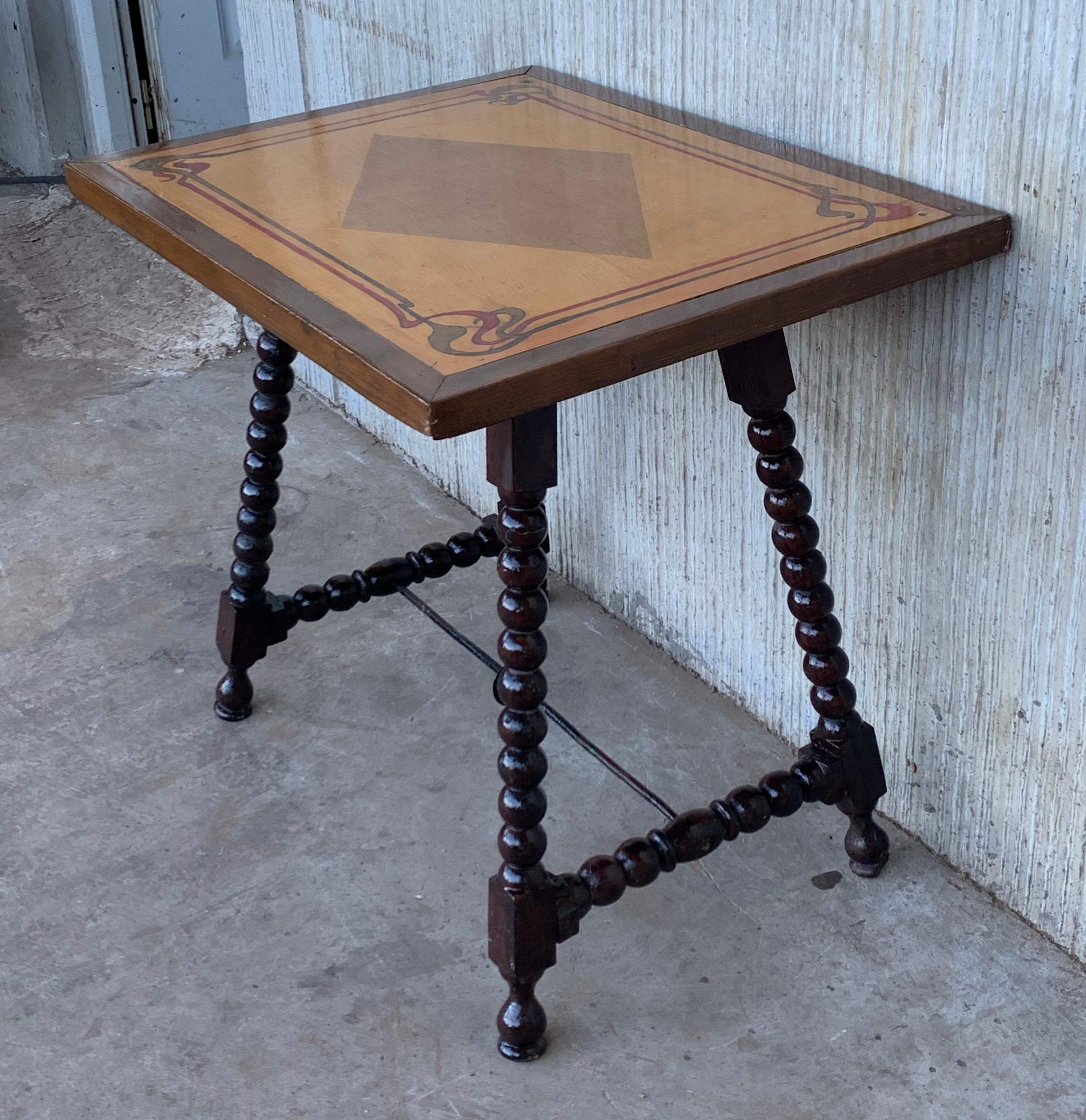 19th century Baroque Spanish side table with marquetry & painted top

19th century Spanish trestle table in walnut. This piece has a great scale, lovely turned legs and beautiful marquetry top. . This table could be used as an end table,