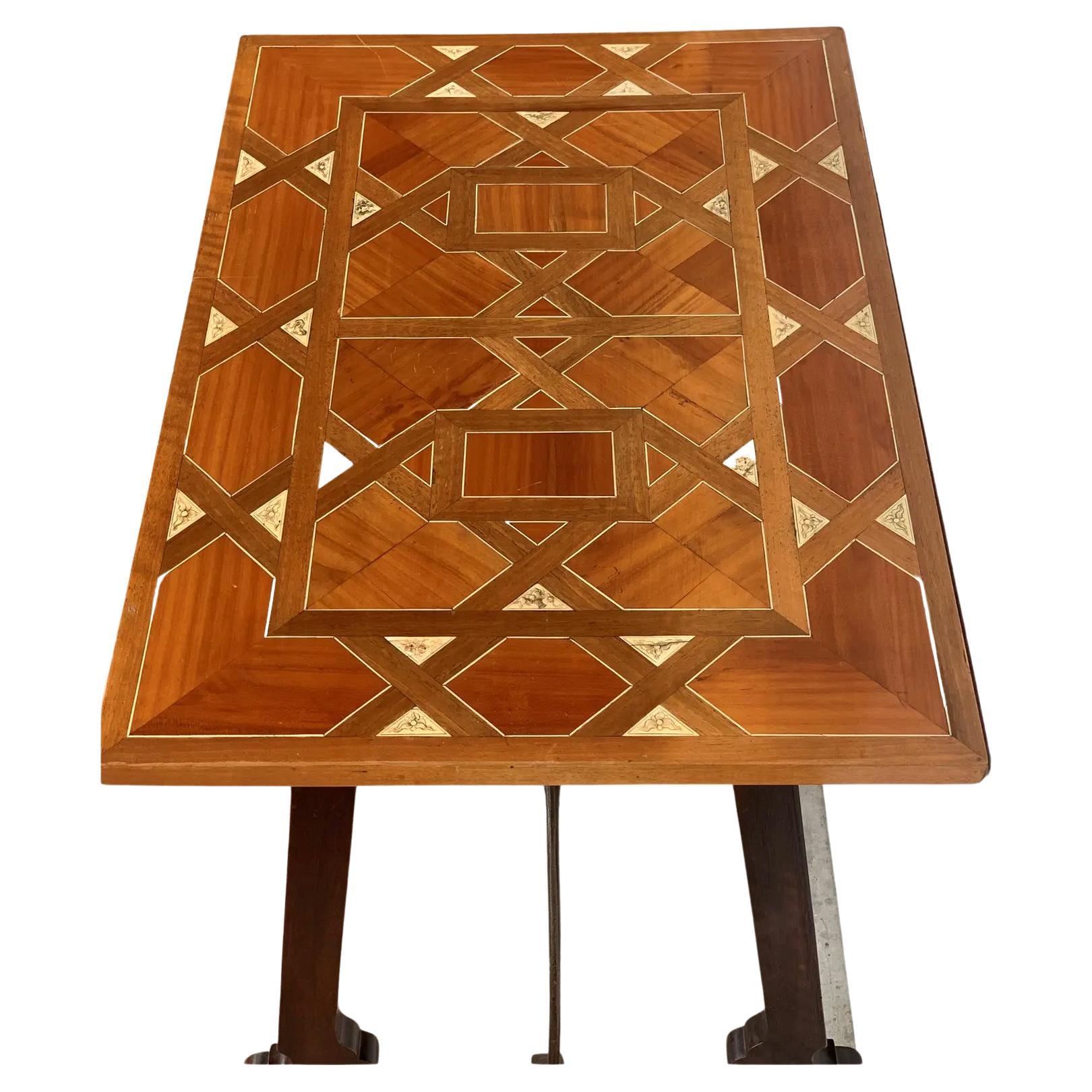 About
19th century Baroque Spanish side table with marquetry top

19th century Spanish trestle table in walnut. This piece has a great scale, lovely lyre legs and beautiful marquetry top. . This table could be used as an end table, nightstand,